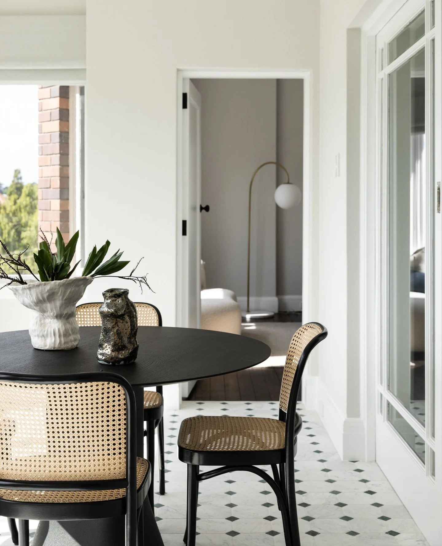The joy of heritage buildings...⁠
Once an open balcony, this sunroom brings light and character into the heart of our Edgecliff Apartment project. We selected a marble patterned floor tile as a not to the building&rsquo;s history while tying seamless