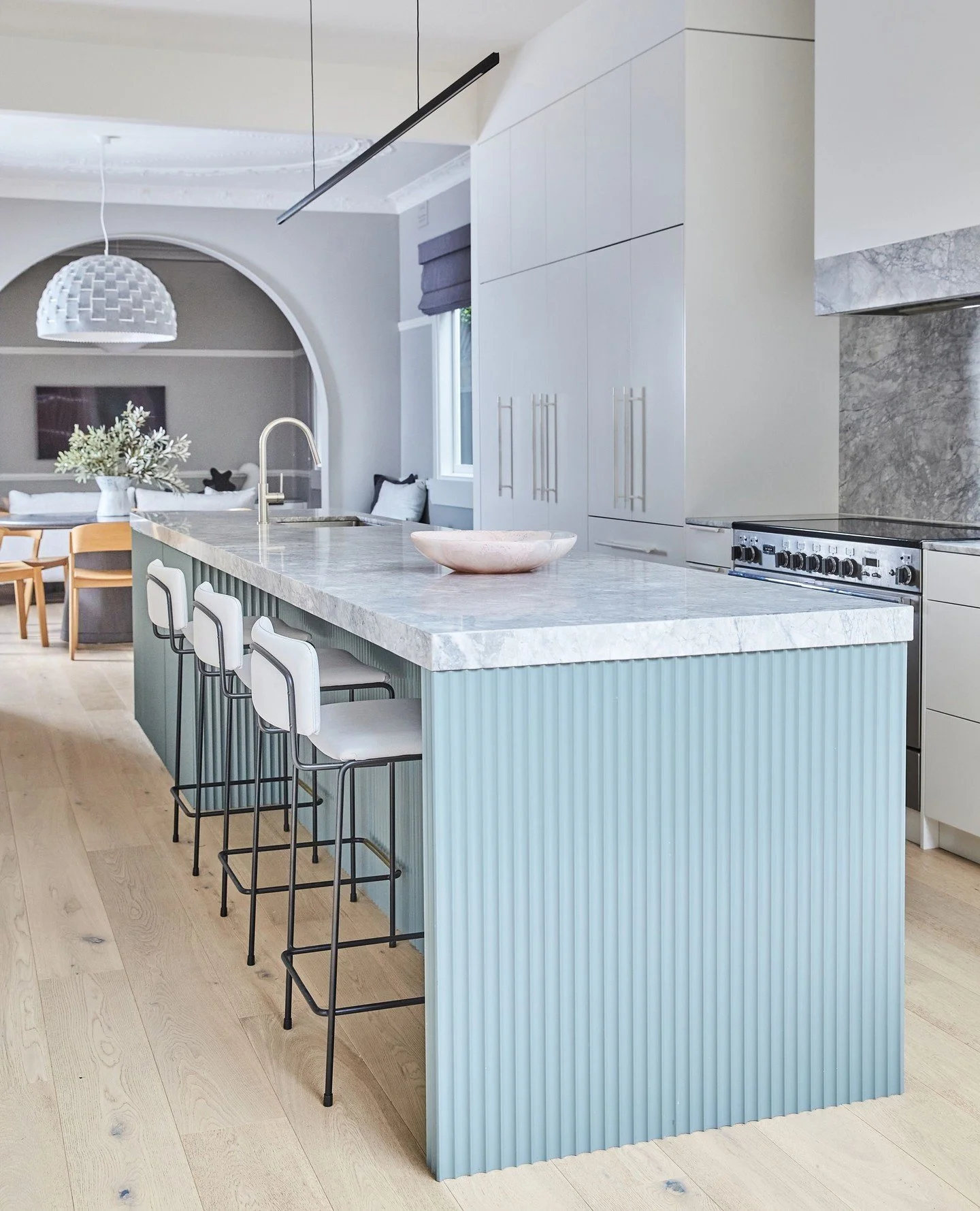 Small in scale, big on impact.⁠
In this compact Balmain home, every detail of the kitchen was designed to work hard &mdash; and look beautiful doing it. The island acts as a multifunctional showpiece, a family dining spot day to day, buffet and bar f