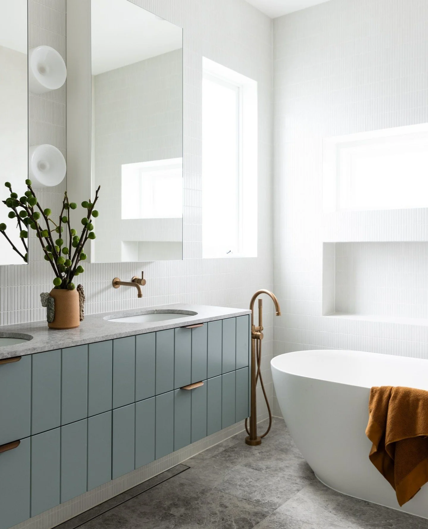 A calm, restorative ensuite was at the heart of this brief, a space to retreat and reset.⁠
⁠
We kept the material palette intentionally restrained, allowing texture and tone to do the work. Limestone grounds the space with softness, microcement bring