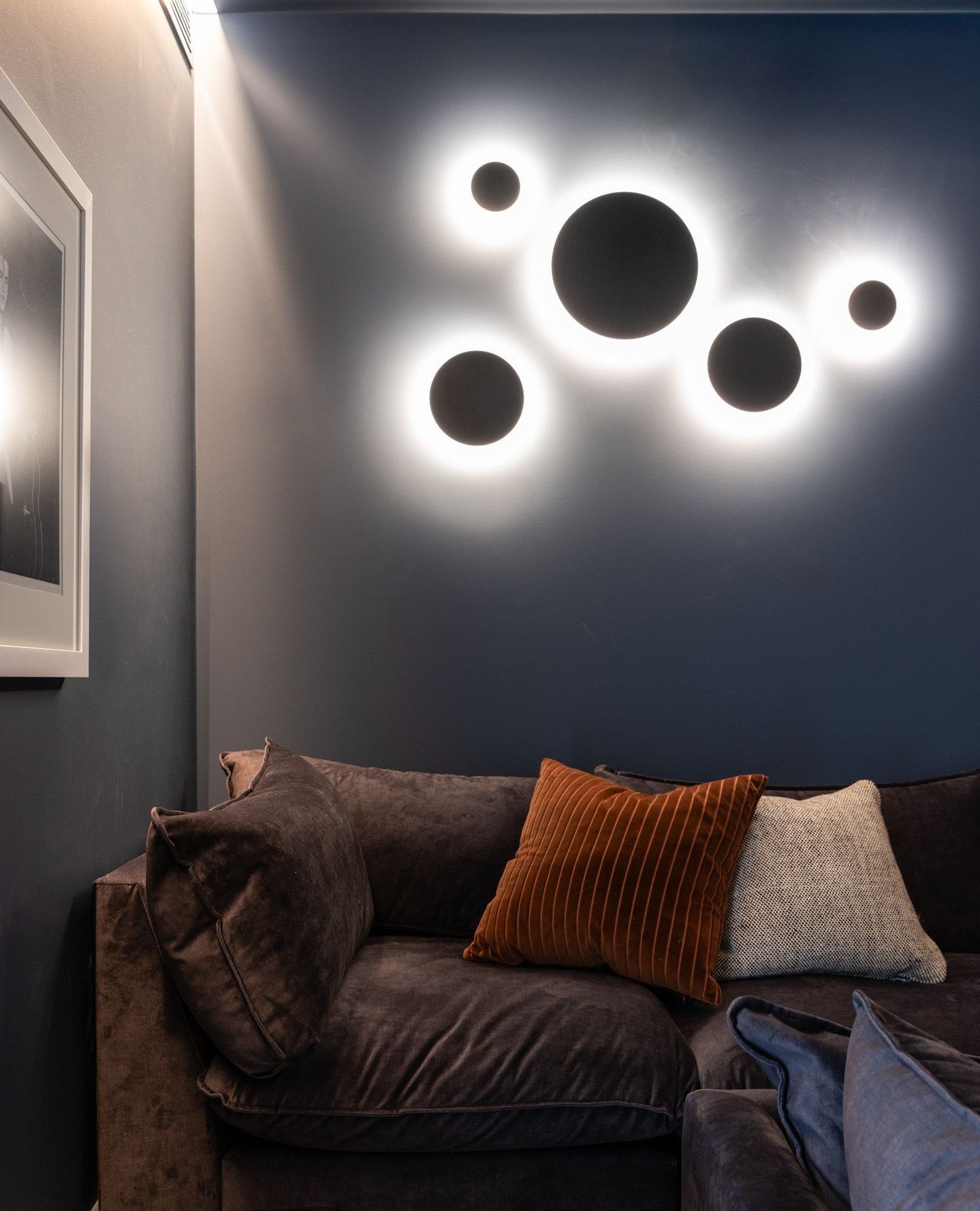 The movie room at North Avoca House is the one space in the home where we fully embraced the dark side.⁠
⁠
Layered in rich colour, soft texture and moody lighting, this room was designed as a retreat from the bright coastal palette found throughout t