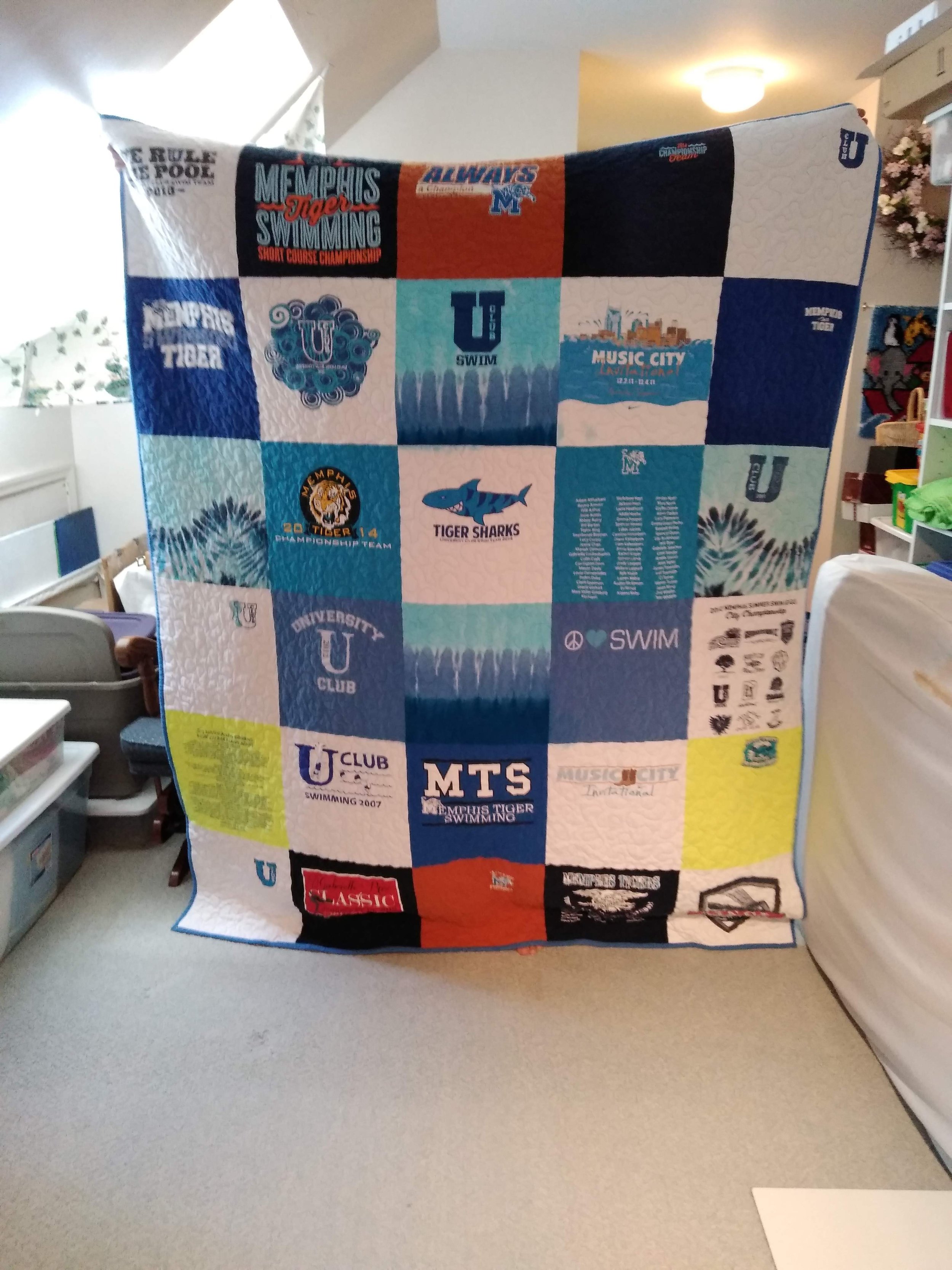 Custom Tshirt Quilts Longarm Quilting Wendell, NC — Quilting Cats Studio Longarm Quilting