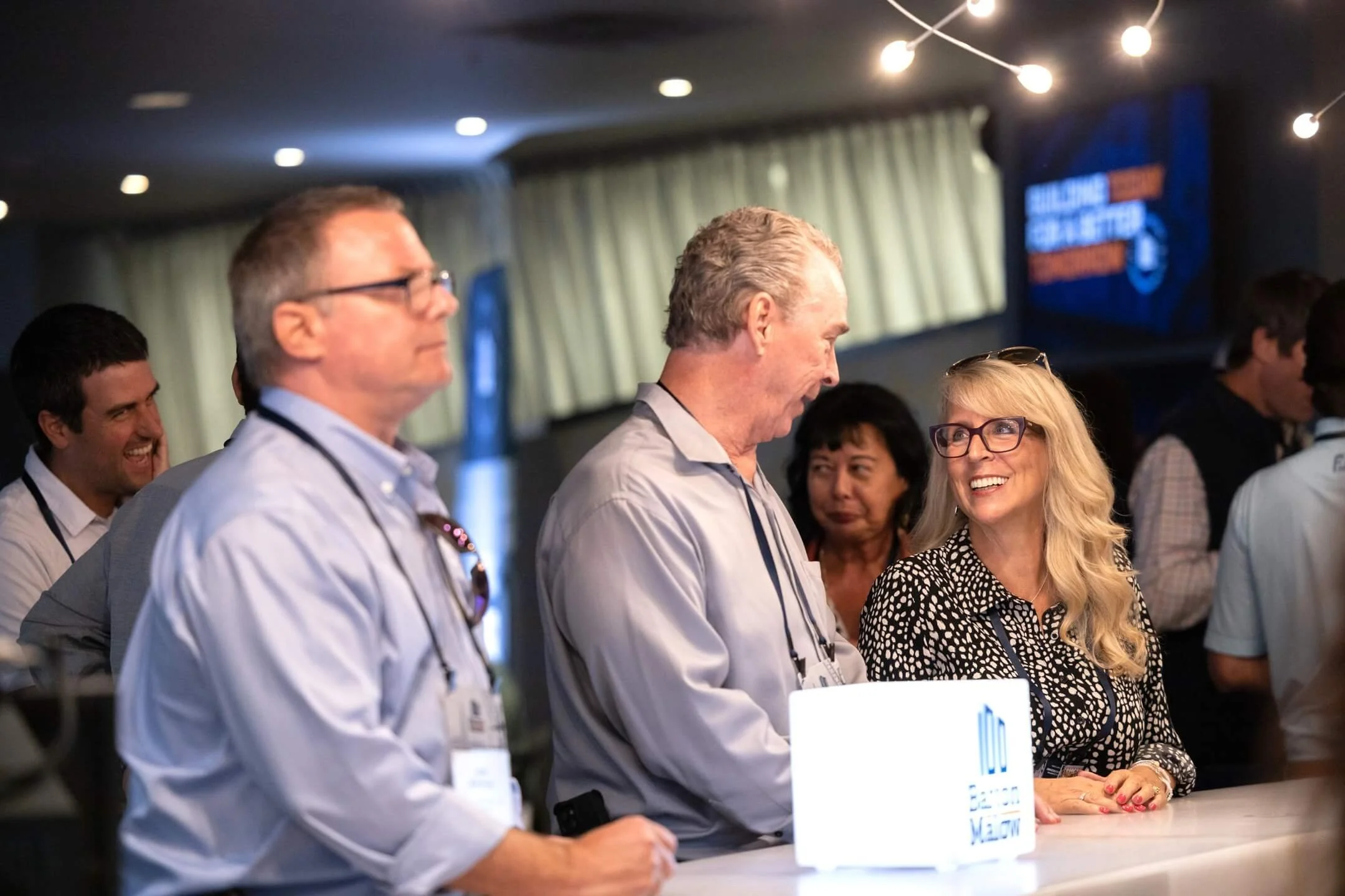 employees laughing at work function