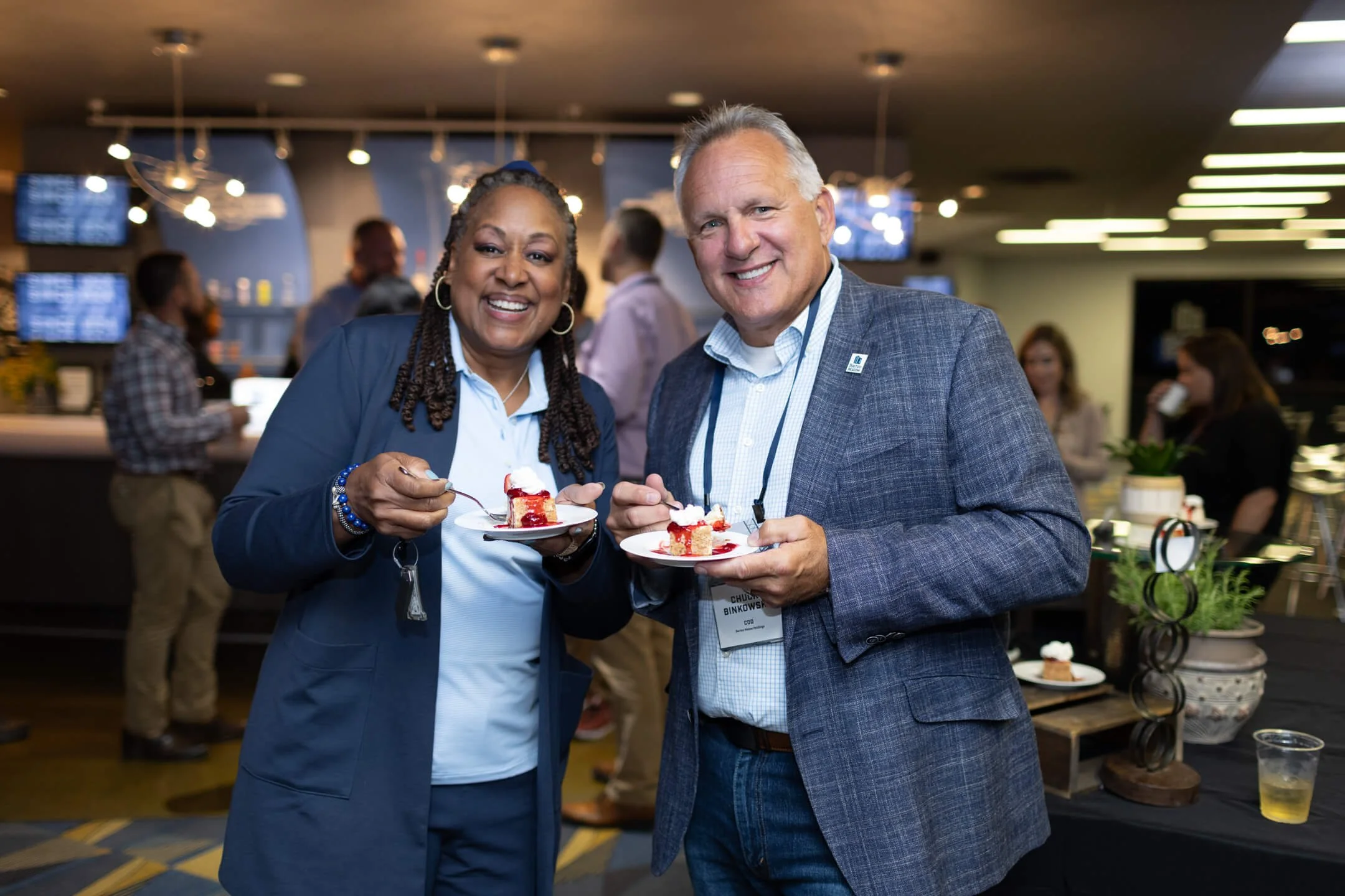 Employers enjoying food at company event