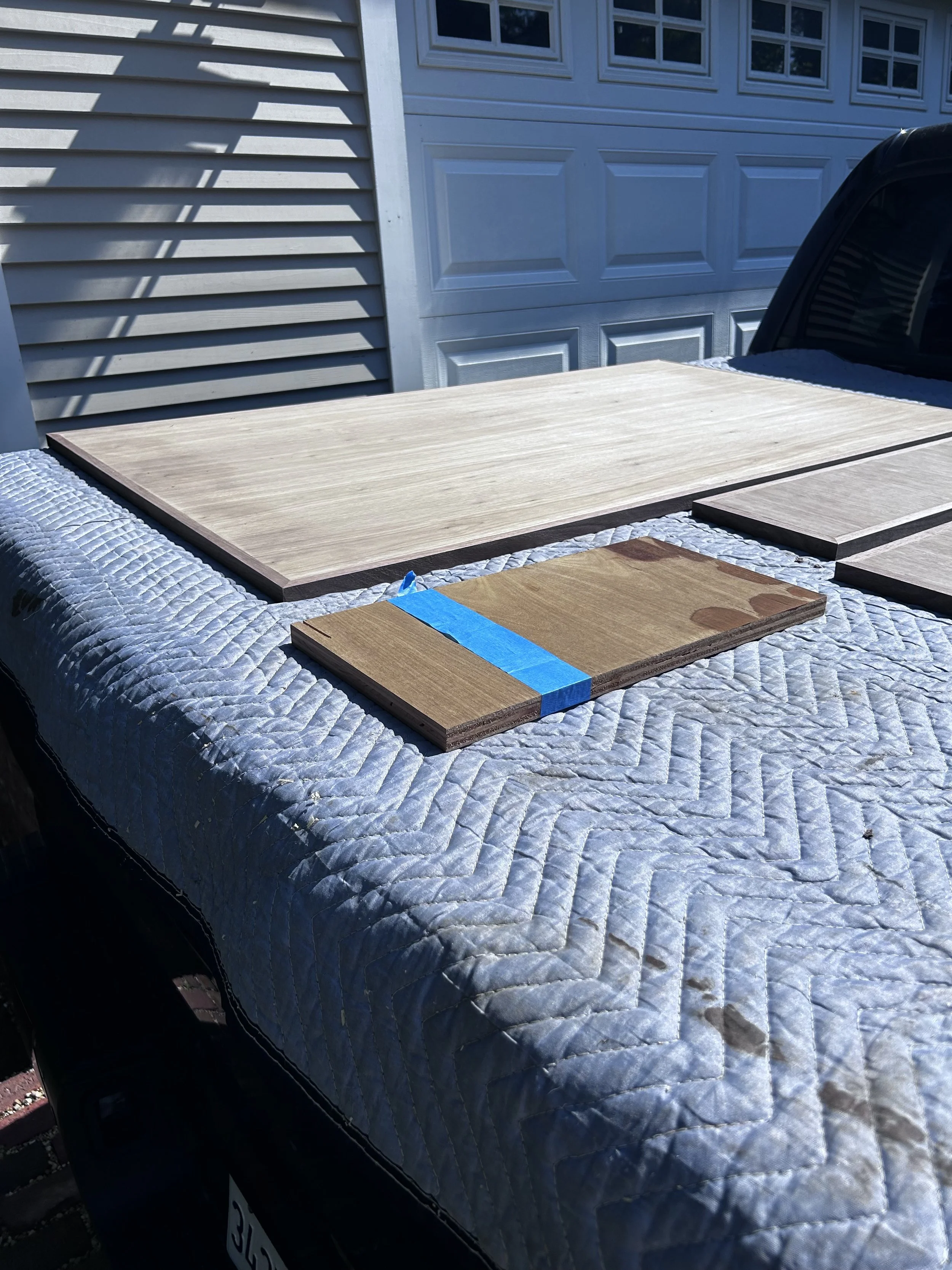 Getting the new Sub Zero panels to exactly match the existing cabinet doors and drawer faces took some experimenting. I sun bleached the wood to try to match the aging of the cabinet wood