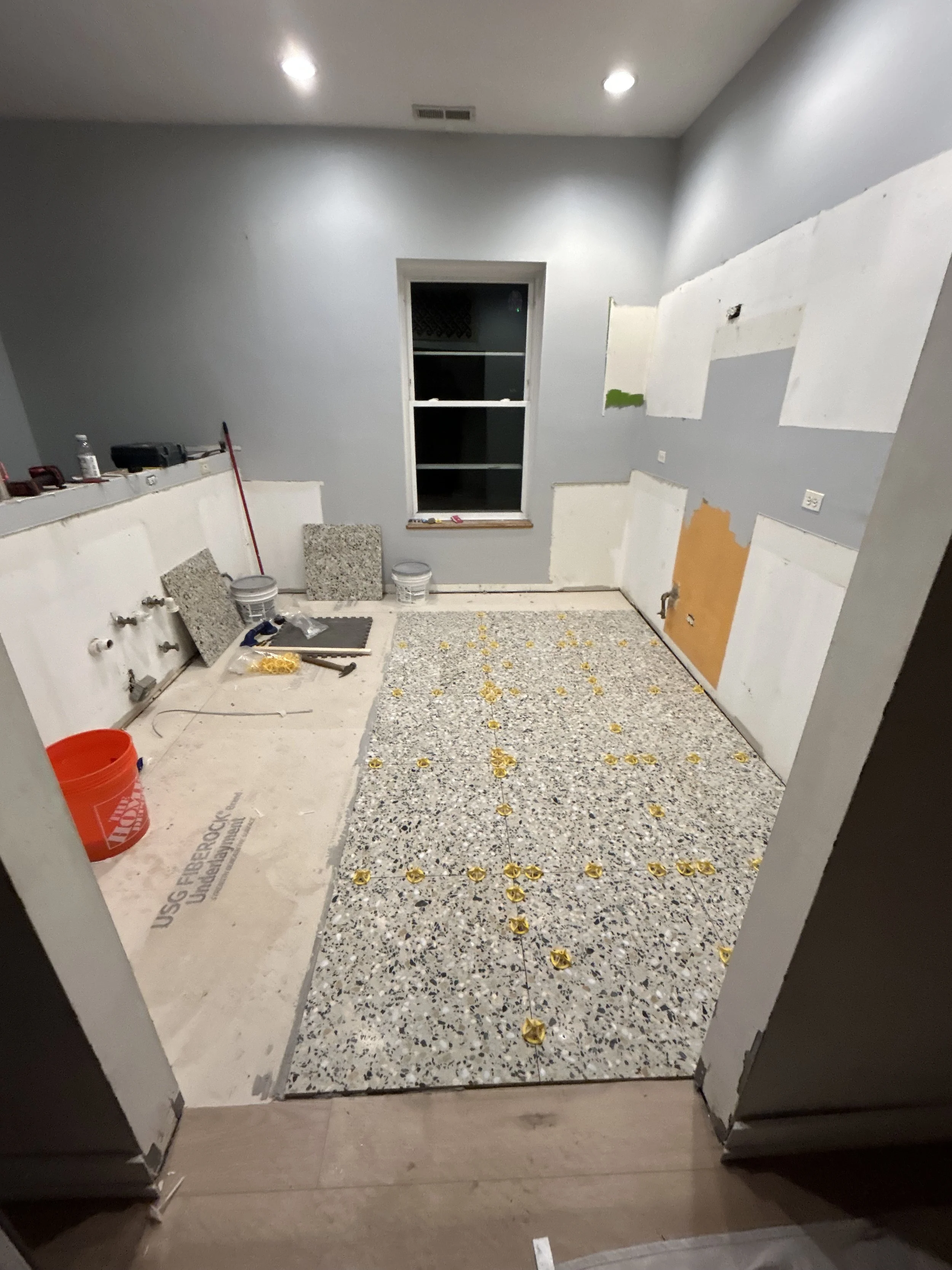 Laying down the new tile