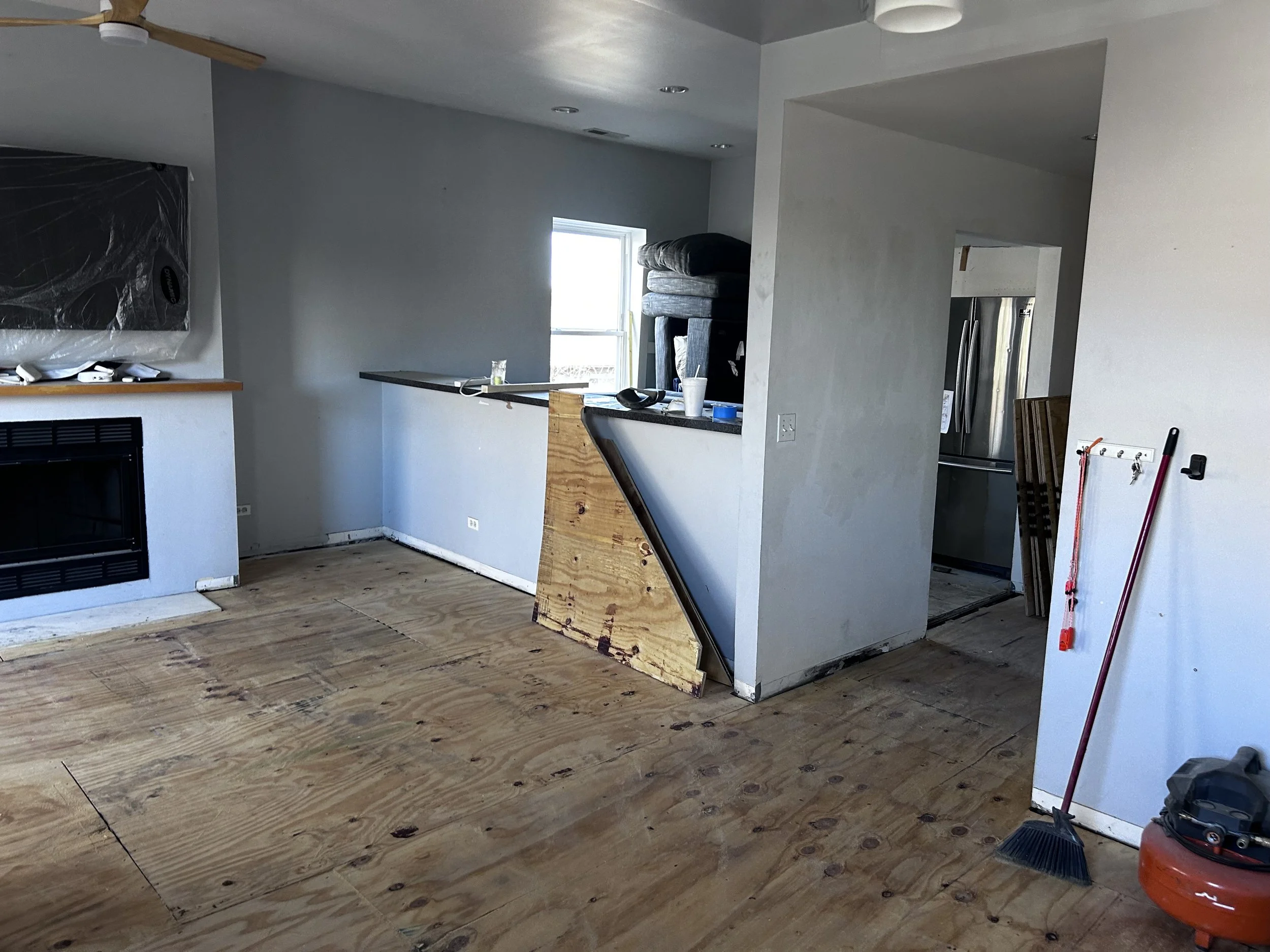 The kitchen floor demo was coordinated with the floor replacement work in the rest of the unit