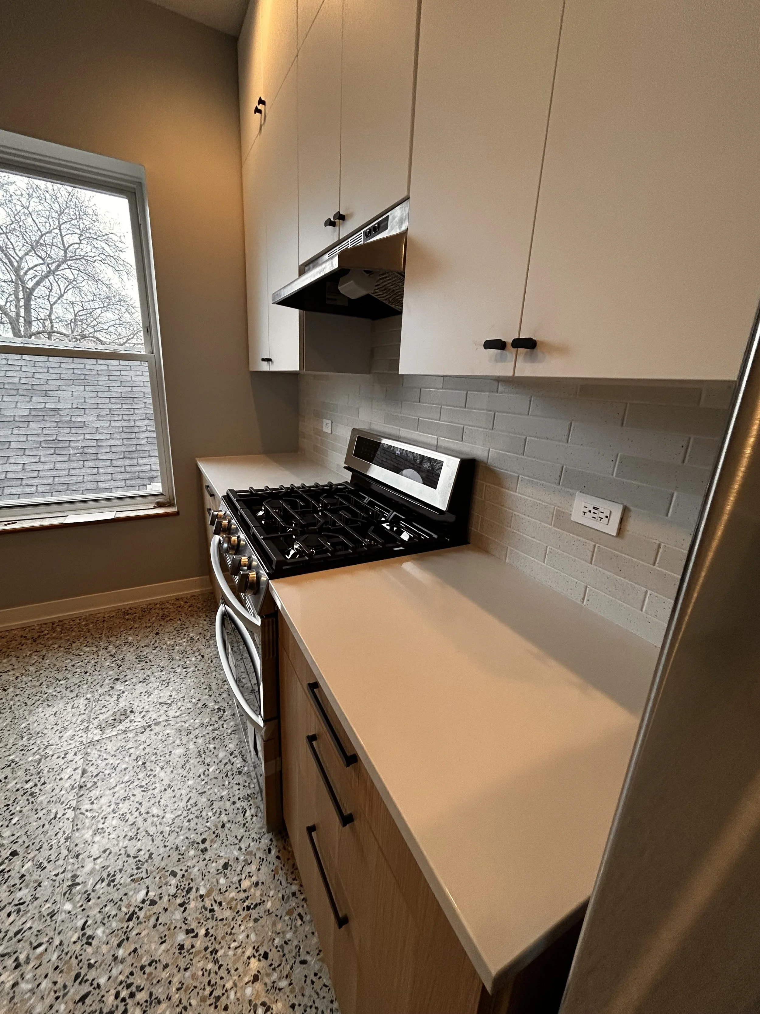 Exhaust hood re-installed, new stove installed