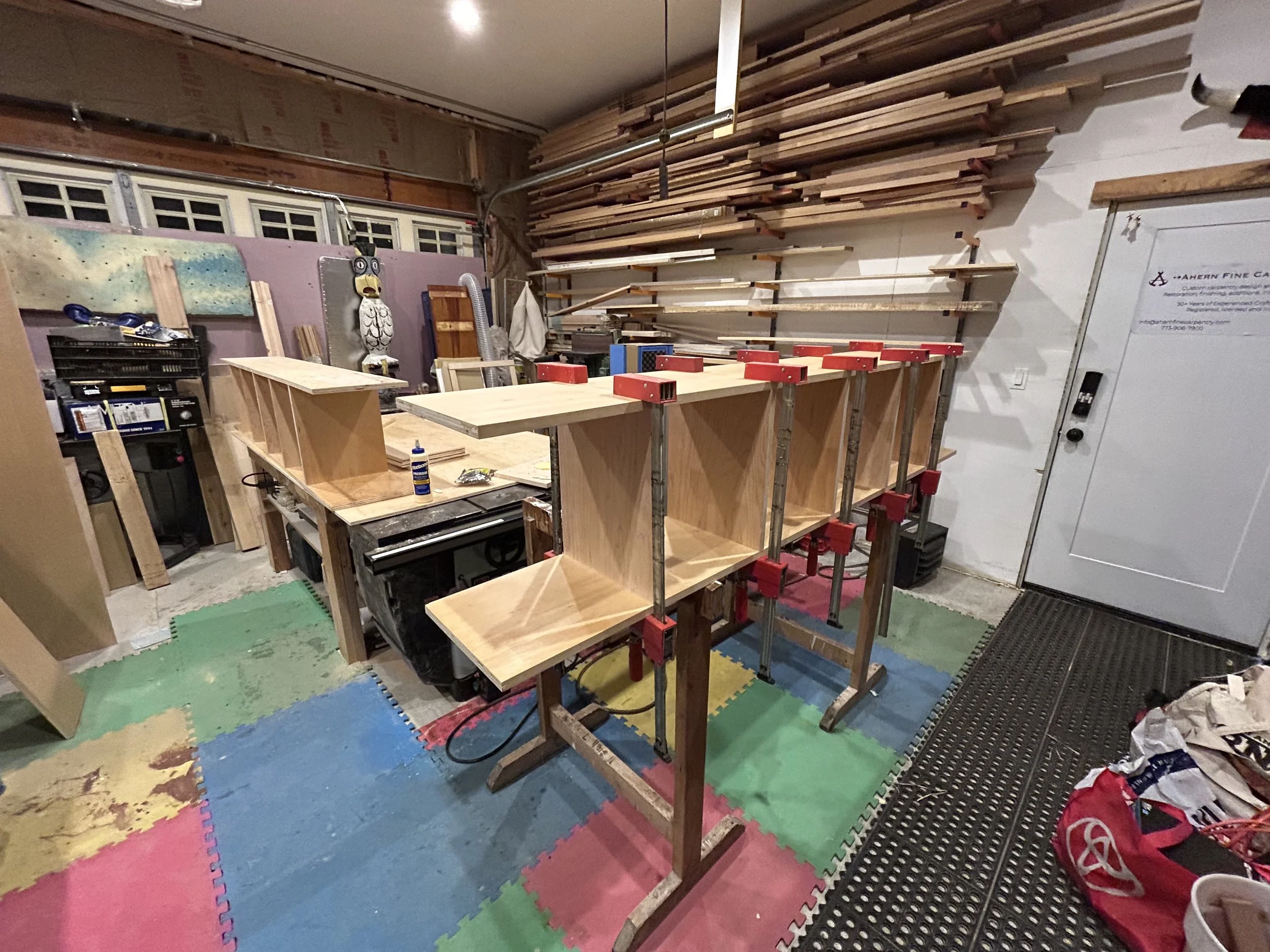 The homeowners have a vinyl collection, so the shelving for one of the built-ins was structured to house it - in sizing and weight