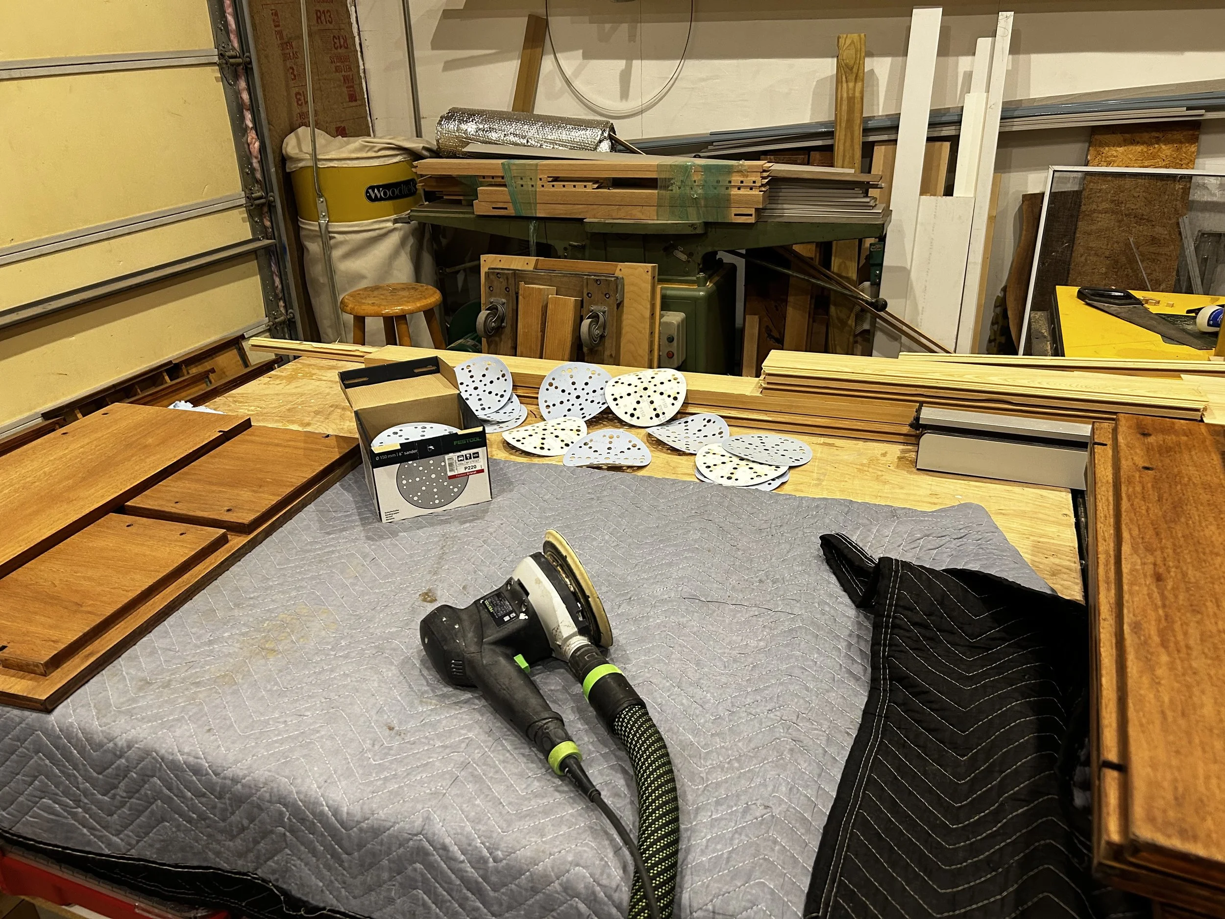 I removed all the cabinet doors and drawer faces, to sand and refinish in my shop