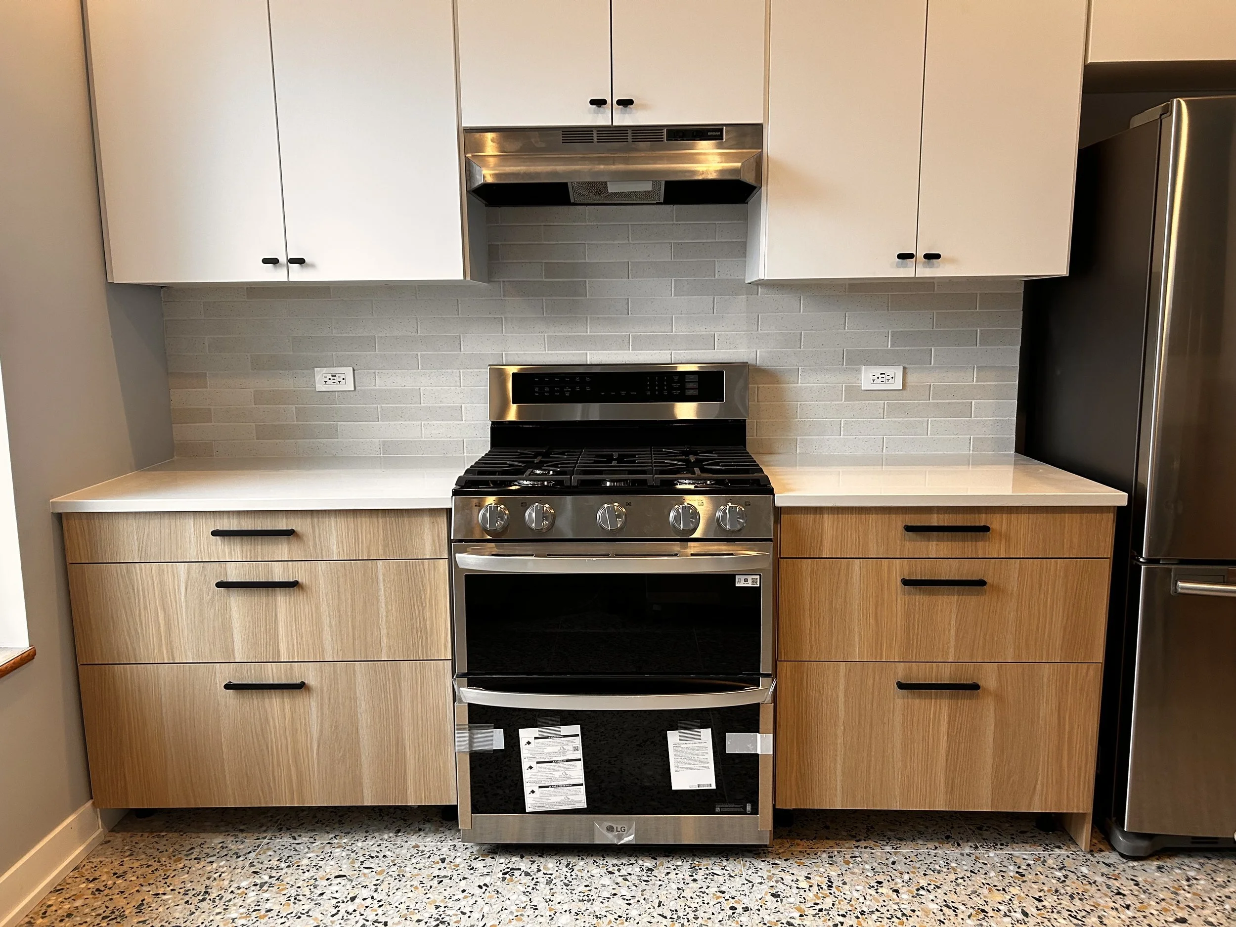 Exhaust hood re-installed, new stove installed