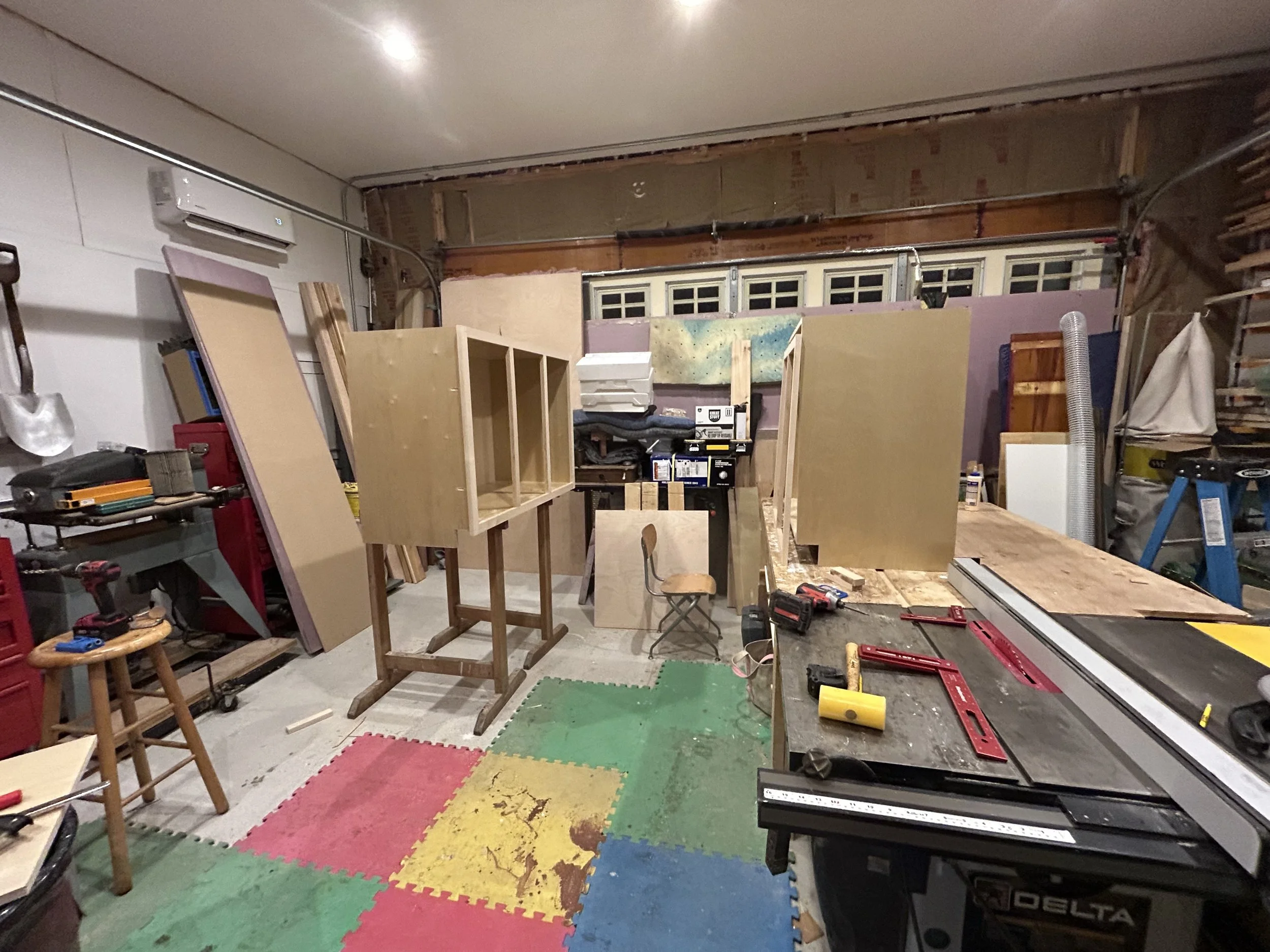 I fabricated the custom built-ins in my shop in parallel with the kitchen work