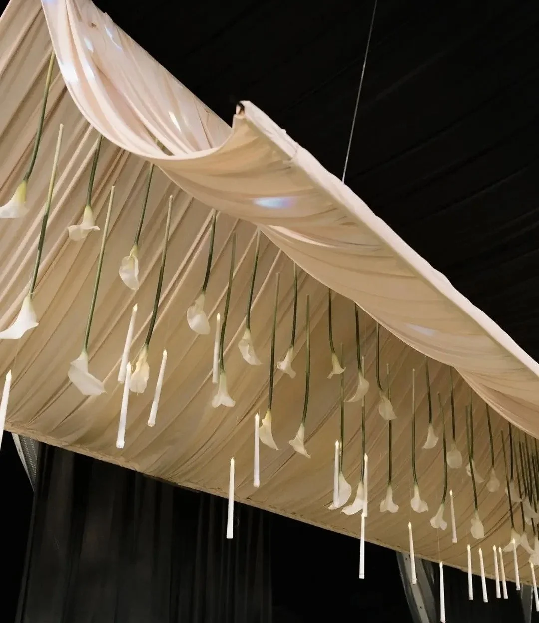 Suspended cala lillies and candles - source unknown.
#TheFallBride
