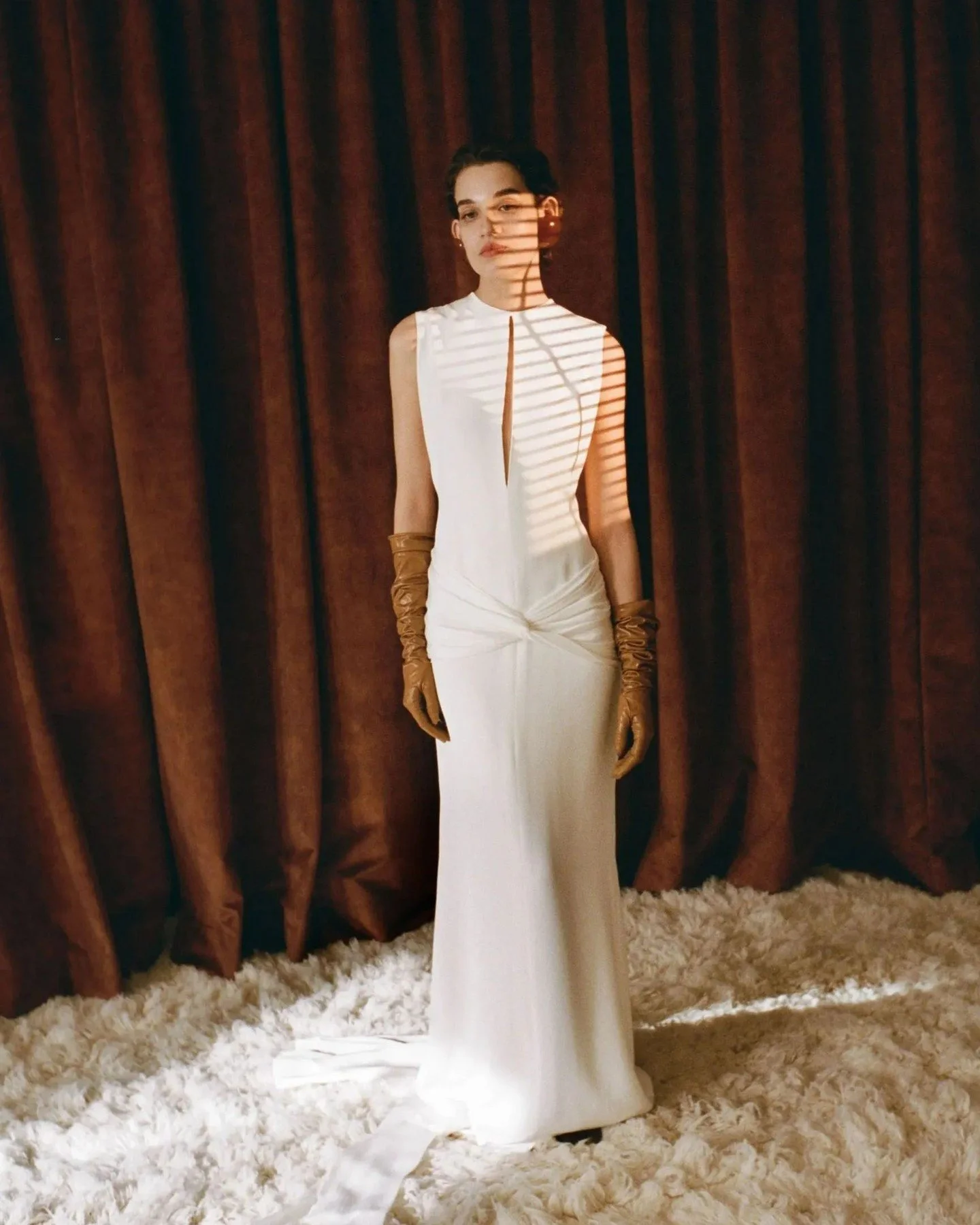 Clunes - a design that pays homage to @lola.varma's iconic Giadi Gown from their 2016 collection. Clunes has a powerful, statuesque structure with a twist of modern draping to flatter.
#TheFallBride