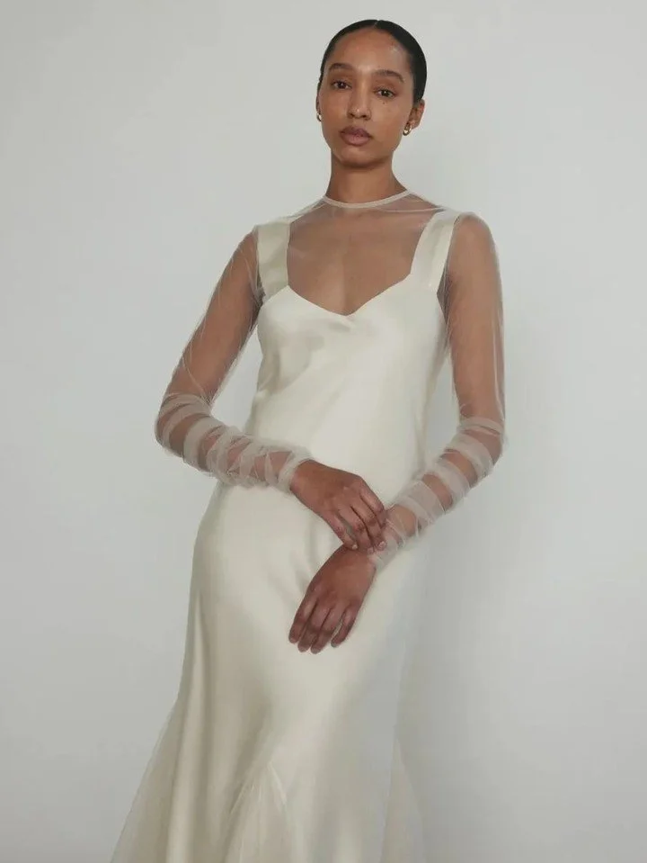The Lisette slip gown paired with the Violette Tulle overlay. The perfect balance between relaxed and elegant. Available for fittings. 
#TheFallBride