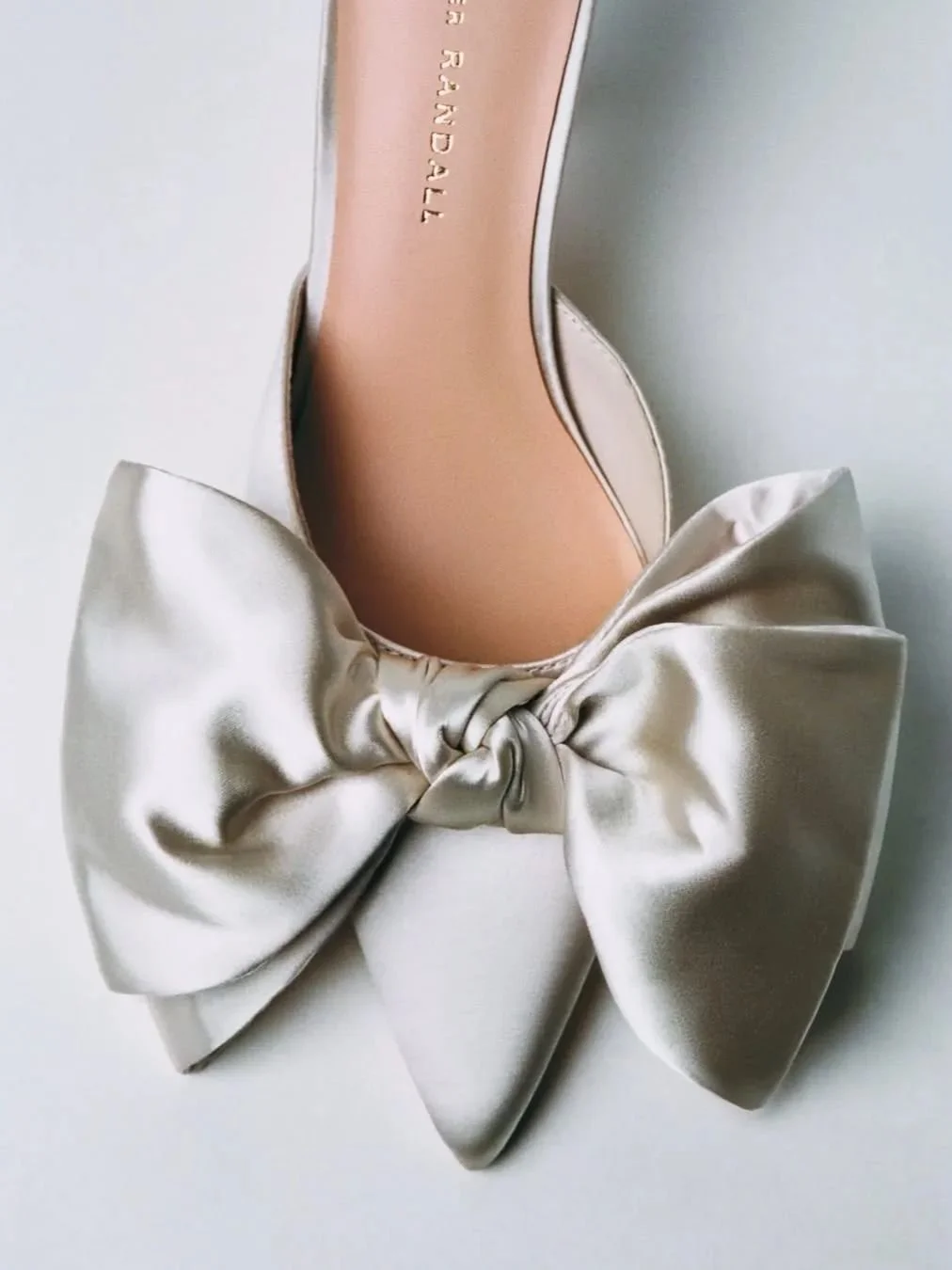 The shoe we can't get enough of - Margot. A closed-toe mule with adjustable bow detail. Shop in-store and online.
#TheFallBride