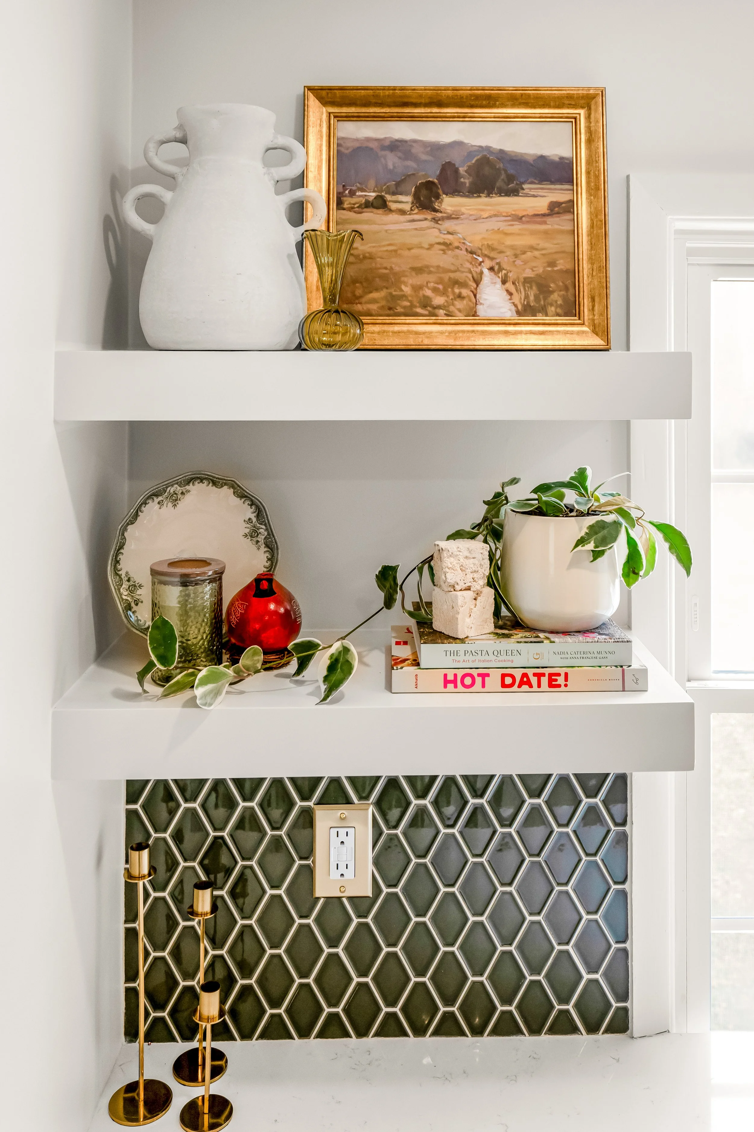 Breakfast bar in a Williamsburg, Virginia kitchen remodel overlooking the backyard, with custom cabinetry and paneled appliances by AWH Interiors.