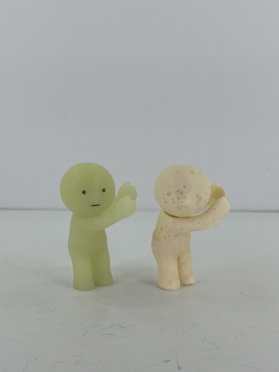 On the left is the original figurine and on the right is the cast resin from the 2-part silicone mold