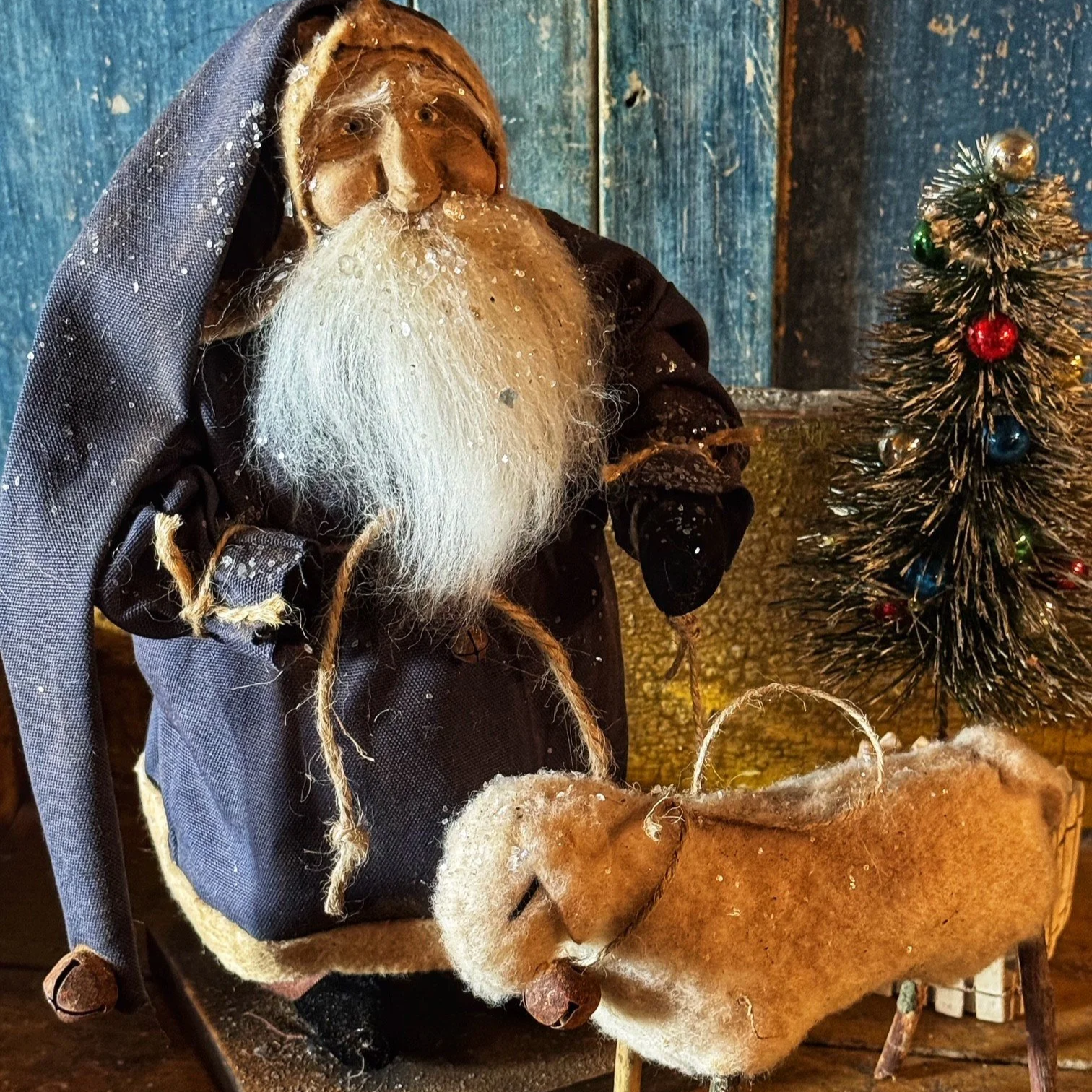 2026 Small Santa wearing navy coat with sheep