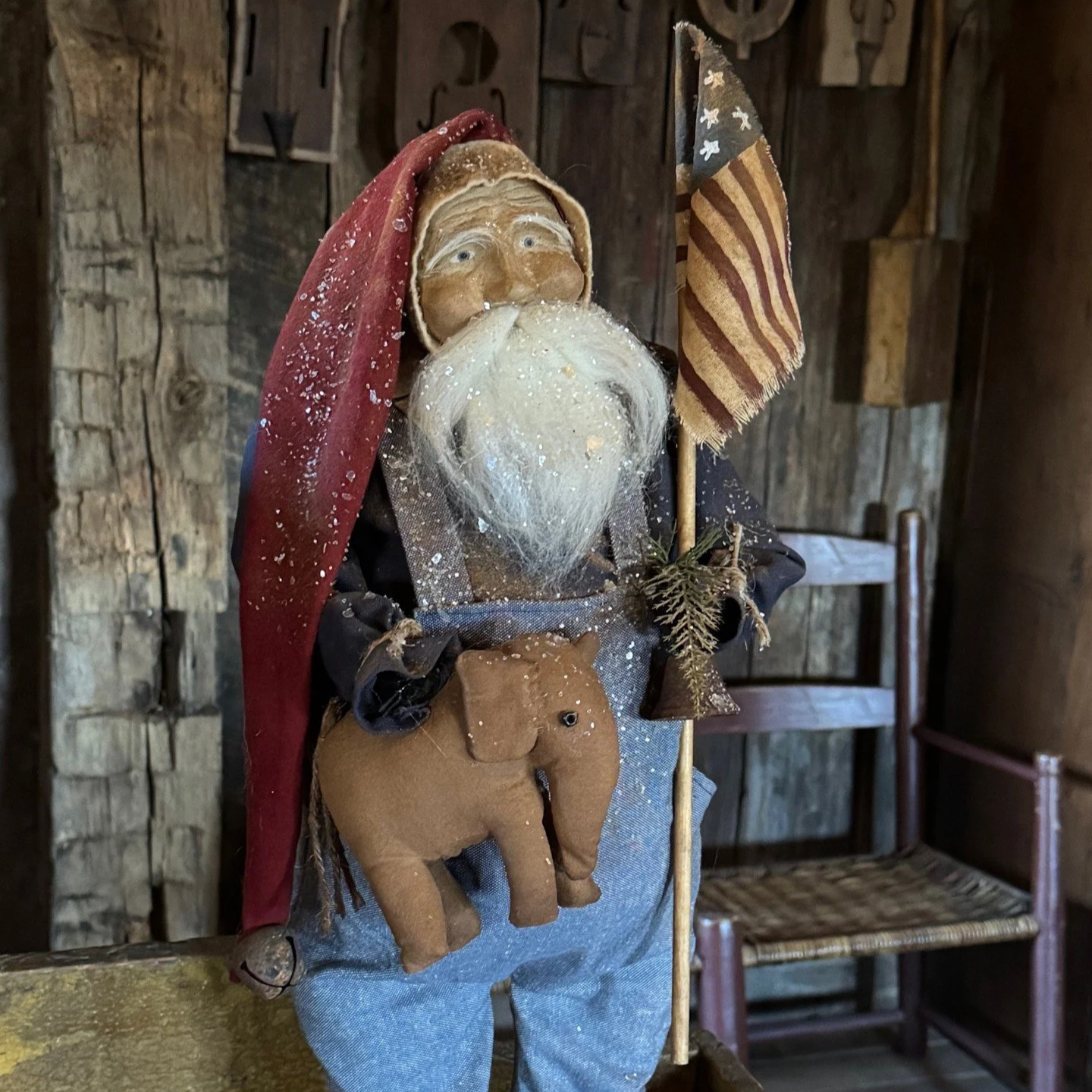 2026 Santa wearing denim overalls holding and elephant and flag