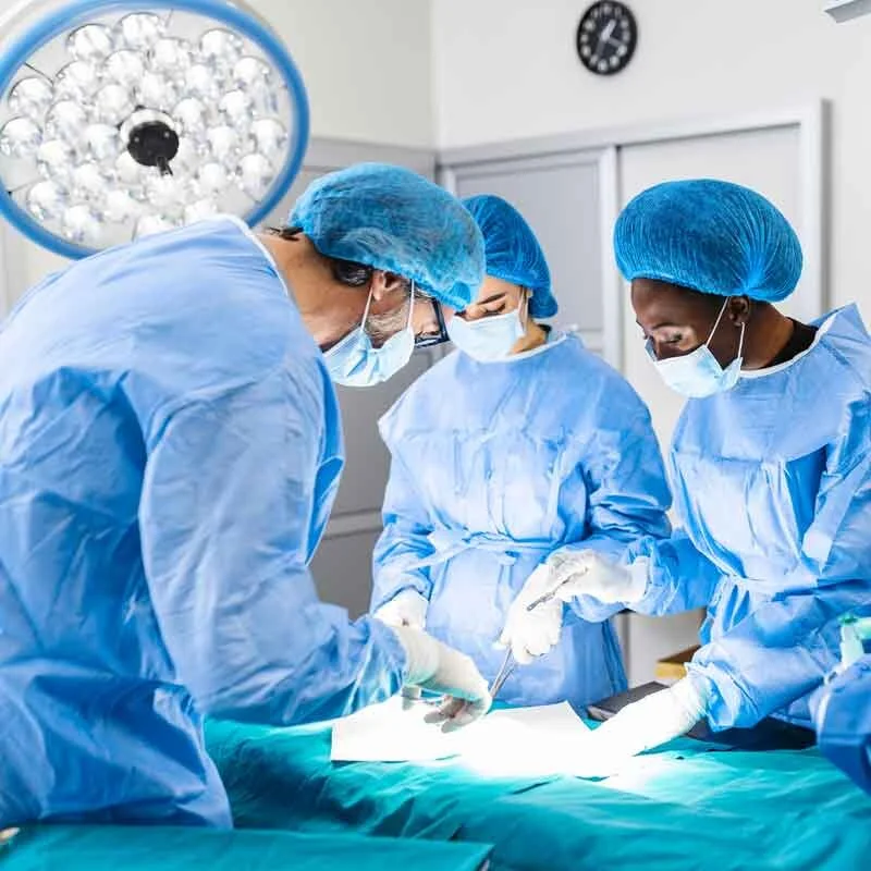 Surgical team performing open heart surgery.