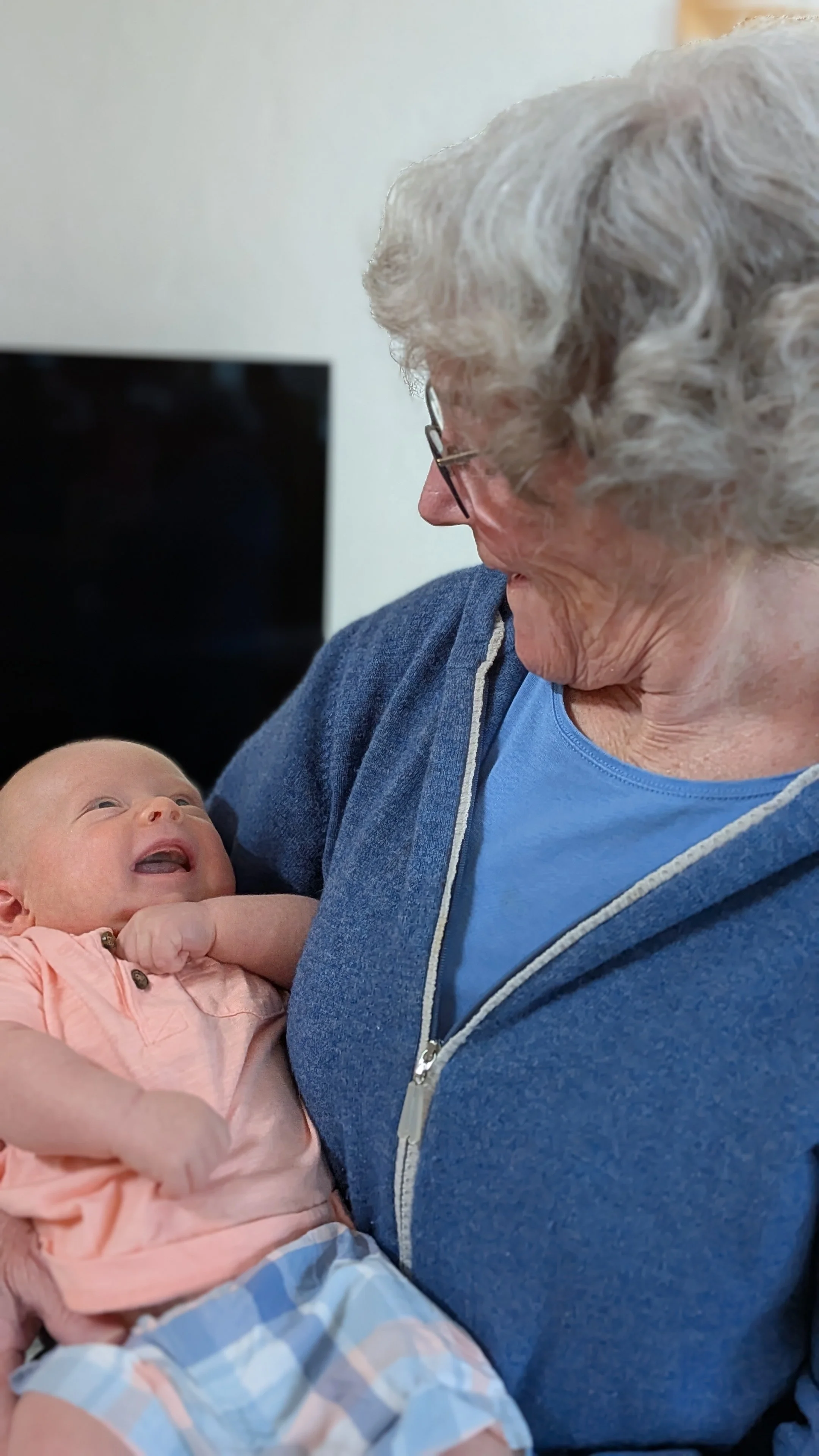 Aunt Meg gets a smile from Casey