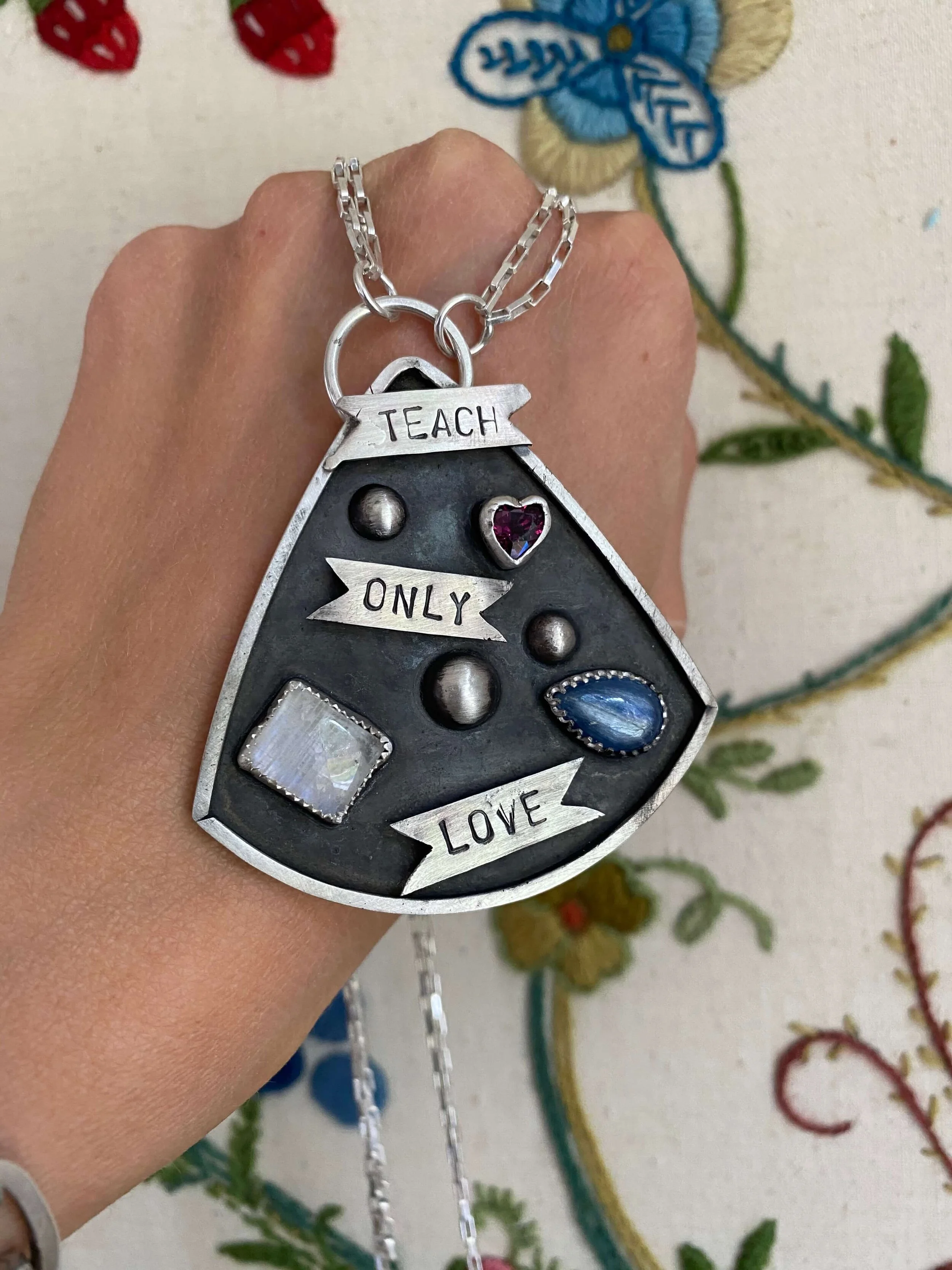 Teach Only Love Necklace .jpeg