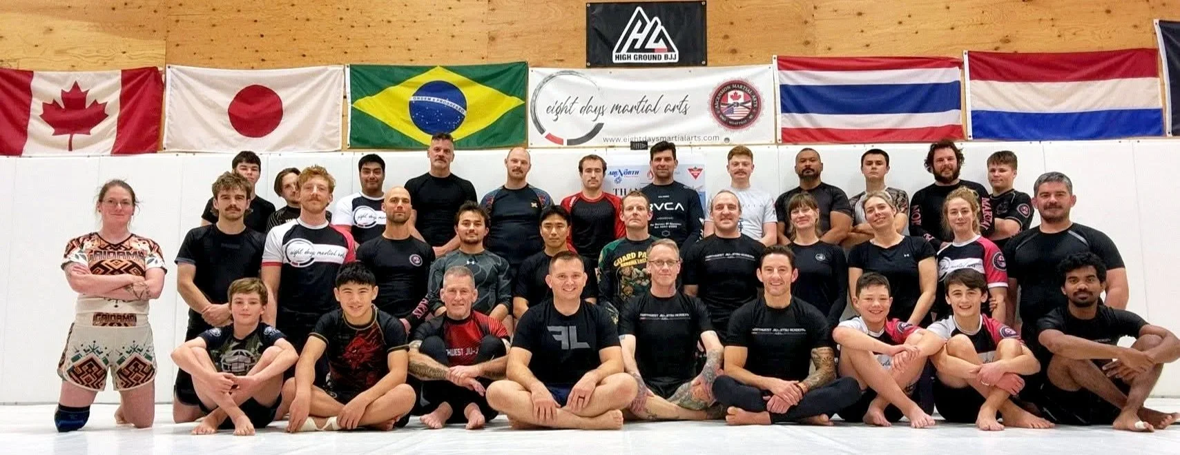 Group photo of no-gi jiu jitsu martial artists in Whitehorse, Yukon, at Eight Days Martial Arts