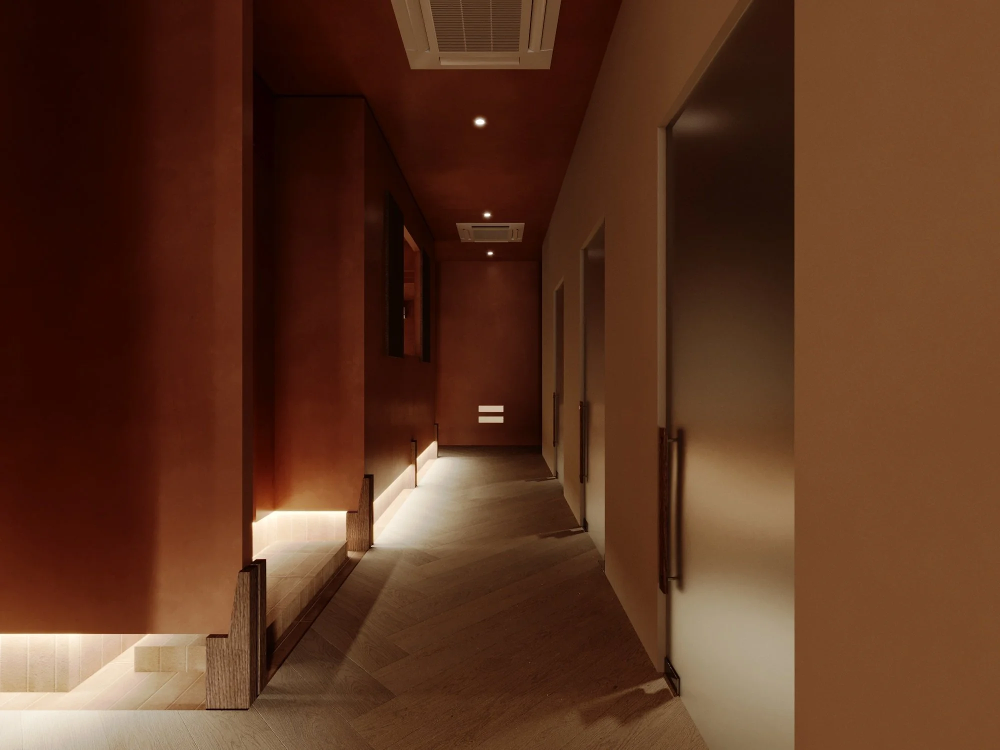 A dimly lit hallway with brown walls and light wooden flooring, featuring recessed ceiling lights and closed white doors with metallic handles.