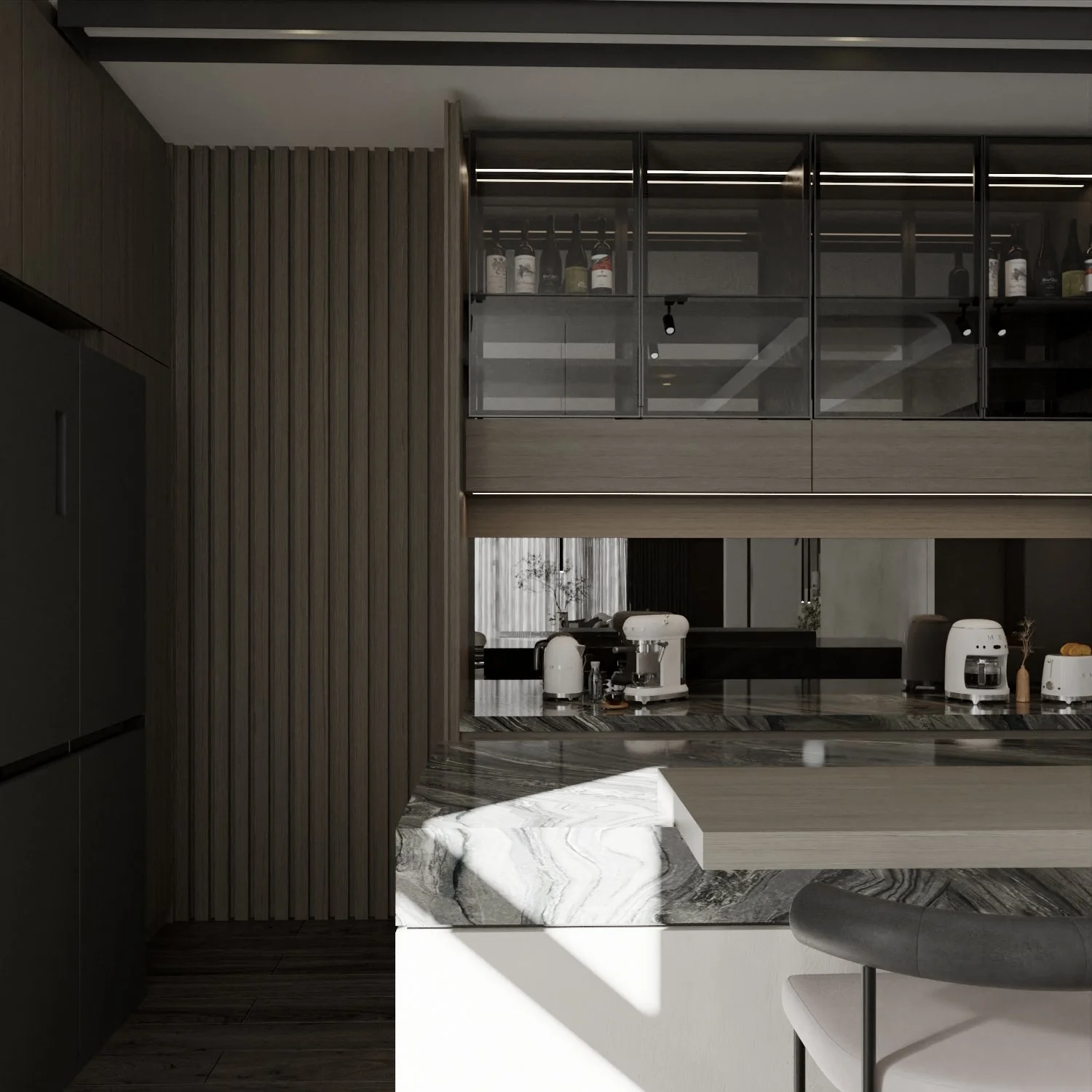 Modern kitchen with dark wood cabinetry, marble countertops, and coffee machines on the counter, viewed through a large opening in the wall with a gray chair in the foreground.