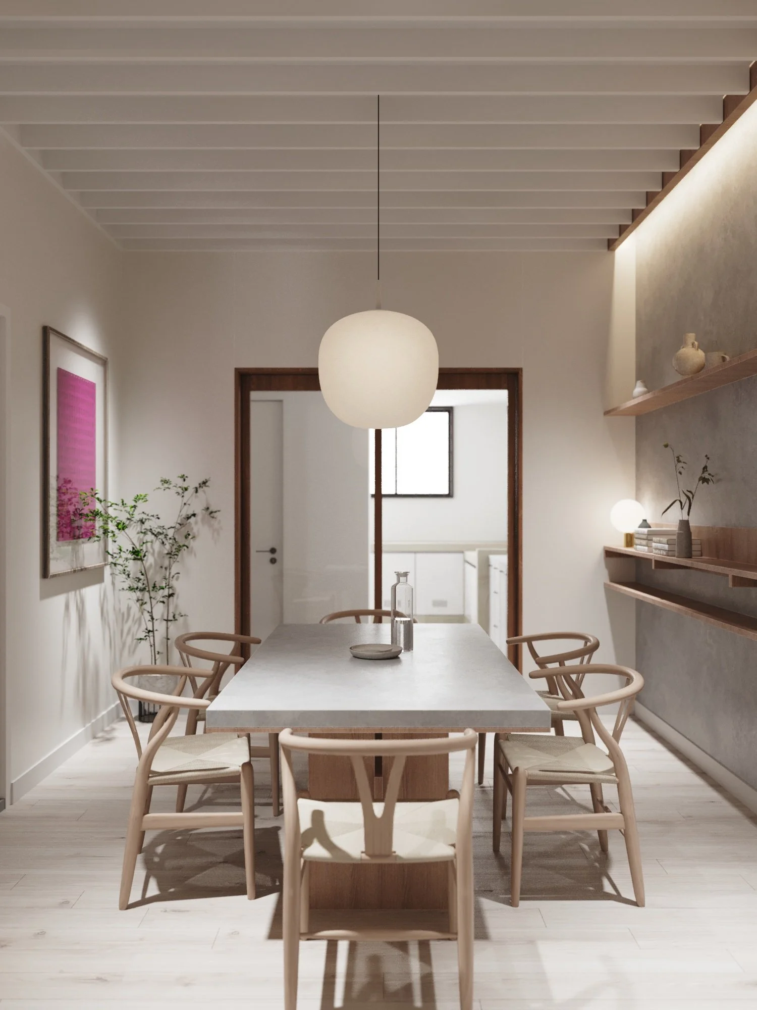 Minimalist dining room with a rectangular table, eight light wood chairs, a hanging paper lantern, and modern decor.