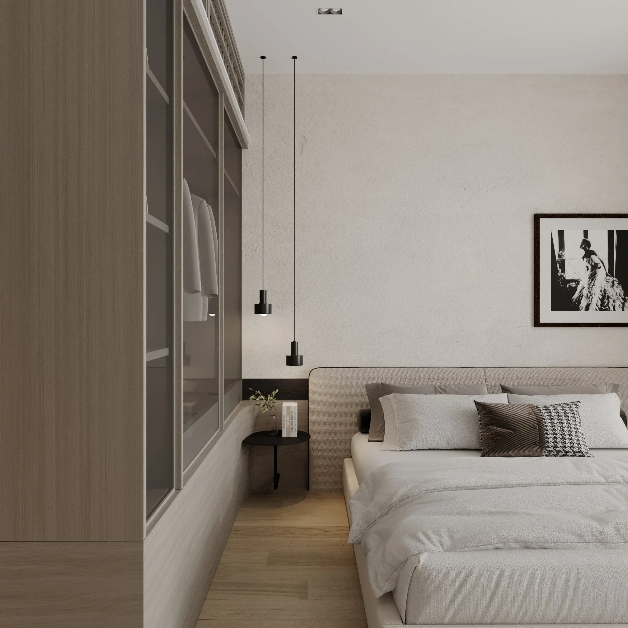 Modern bedroom with a minimalist design, featuring a bed with neutral bedding, a small black bedside table with books and a plant, black pendant lights hanging from the ceiling, and a framed black and white photograph on the wall.