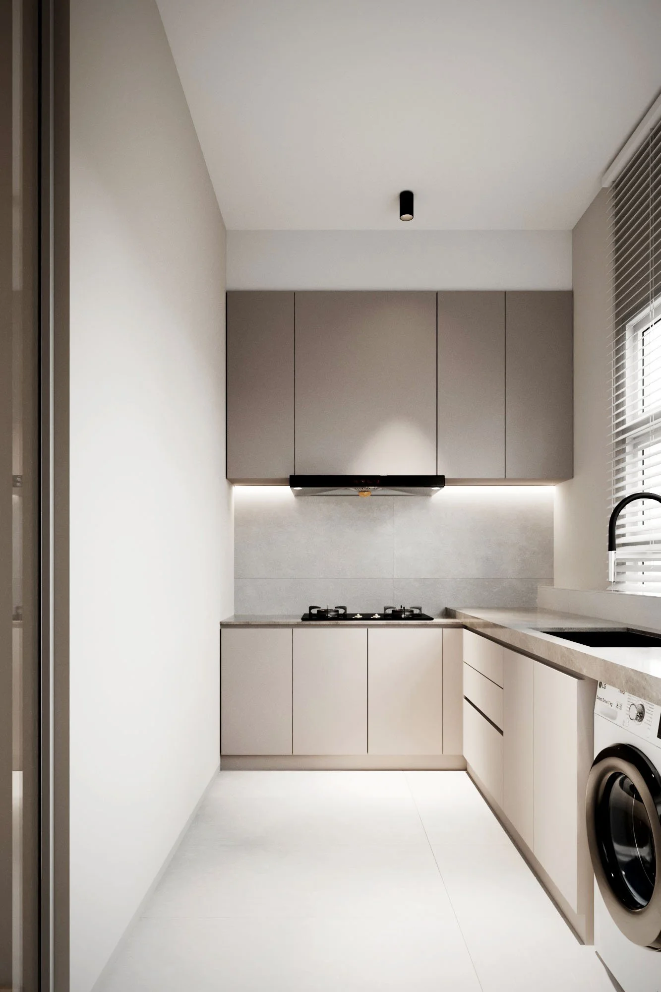 Modern kitchen with beige cabinets, gray backsplash, built-in oven, washing machine, and a window with blinds.
