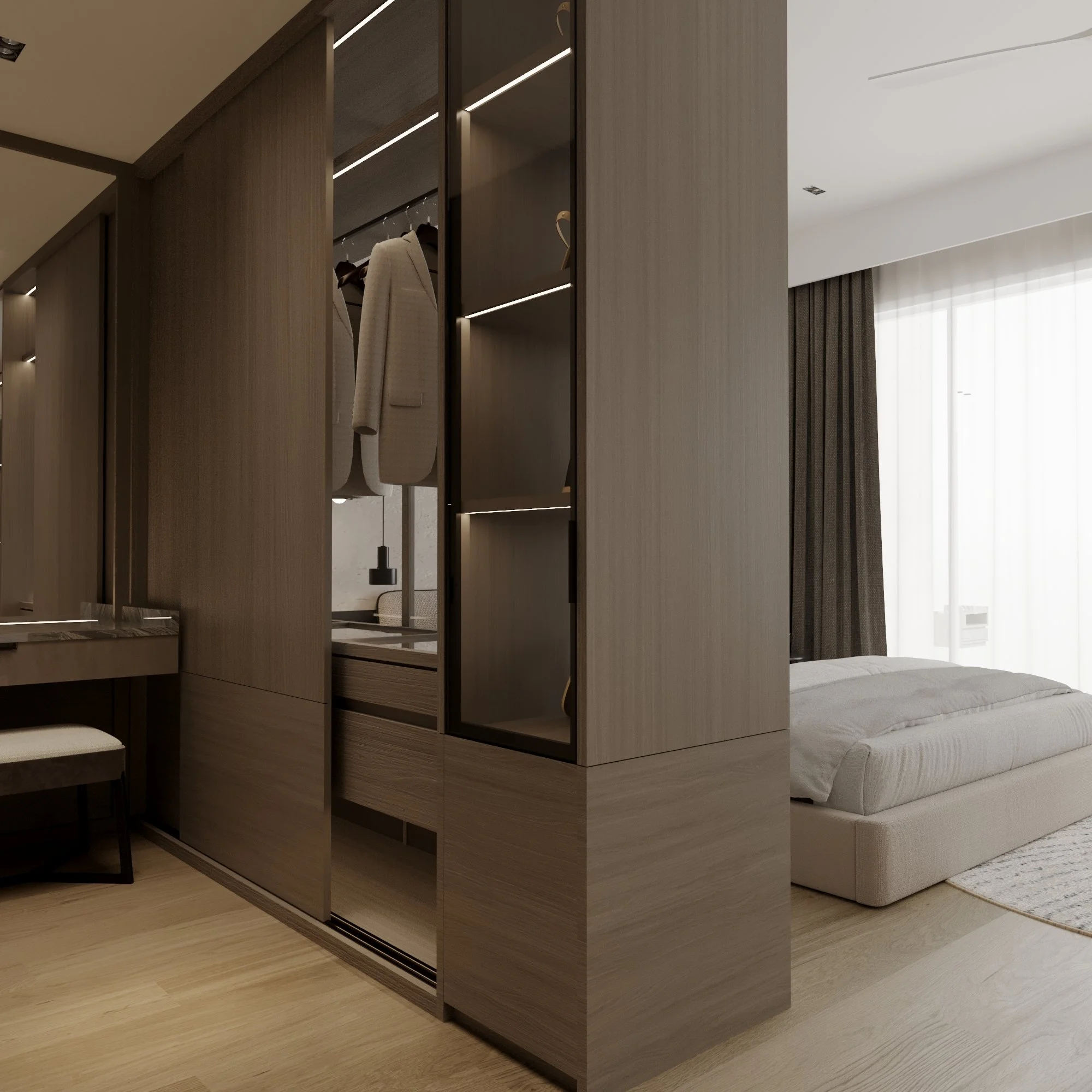 Modern bedroom with a built-in wardrobe, partially open, showing hanging clothes. A bed with white bedding and a sheer curtain-covered window are visible in the background.