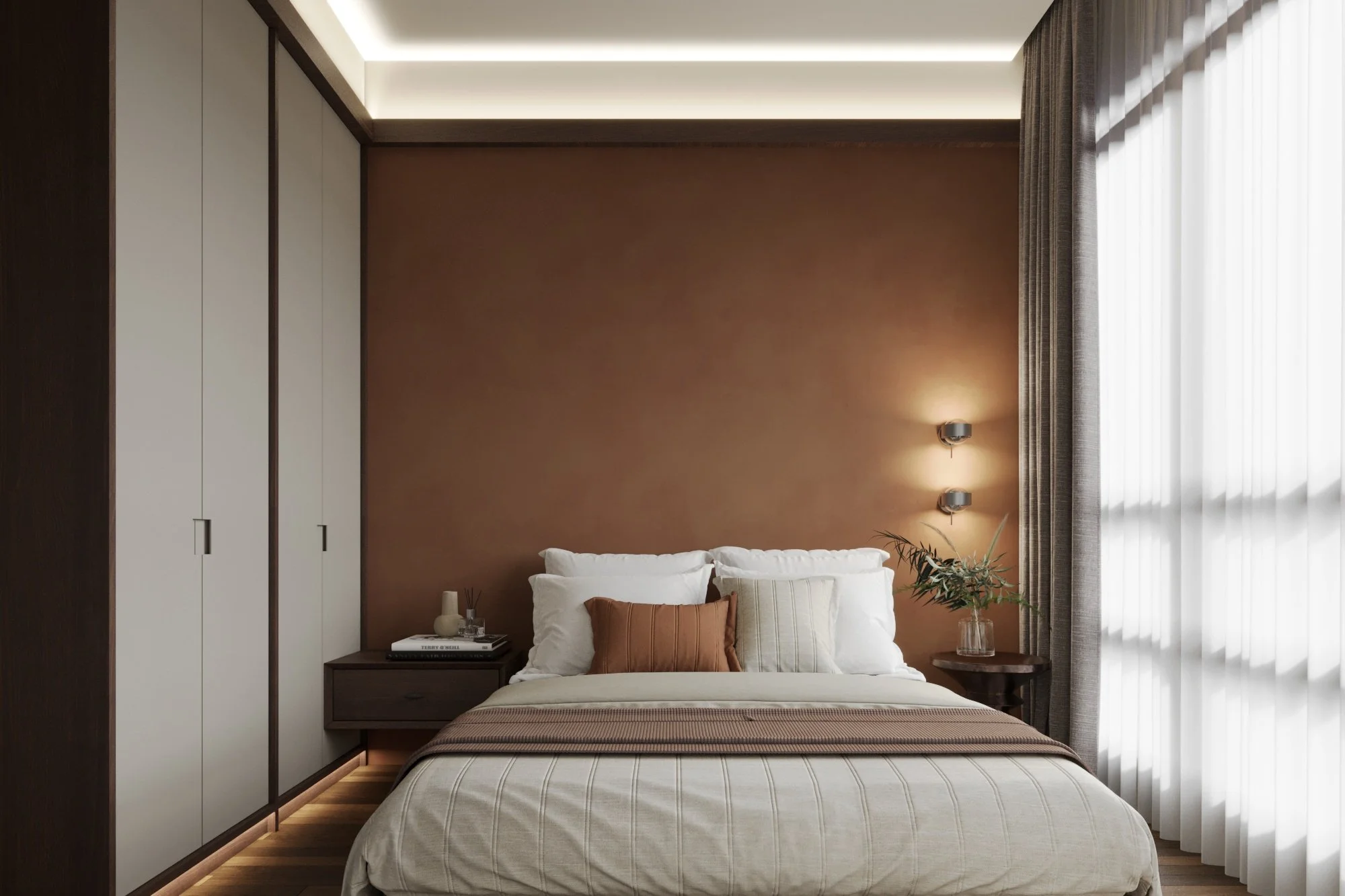 Modern bedroom with a beige bed, white pillows, and a brown decorative pillow, nightstand with decor on the left, a plant on the right, and large window with sheer curtains on the right side.