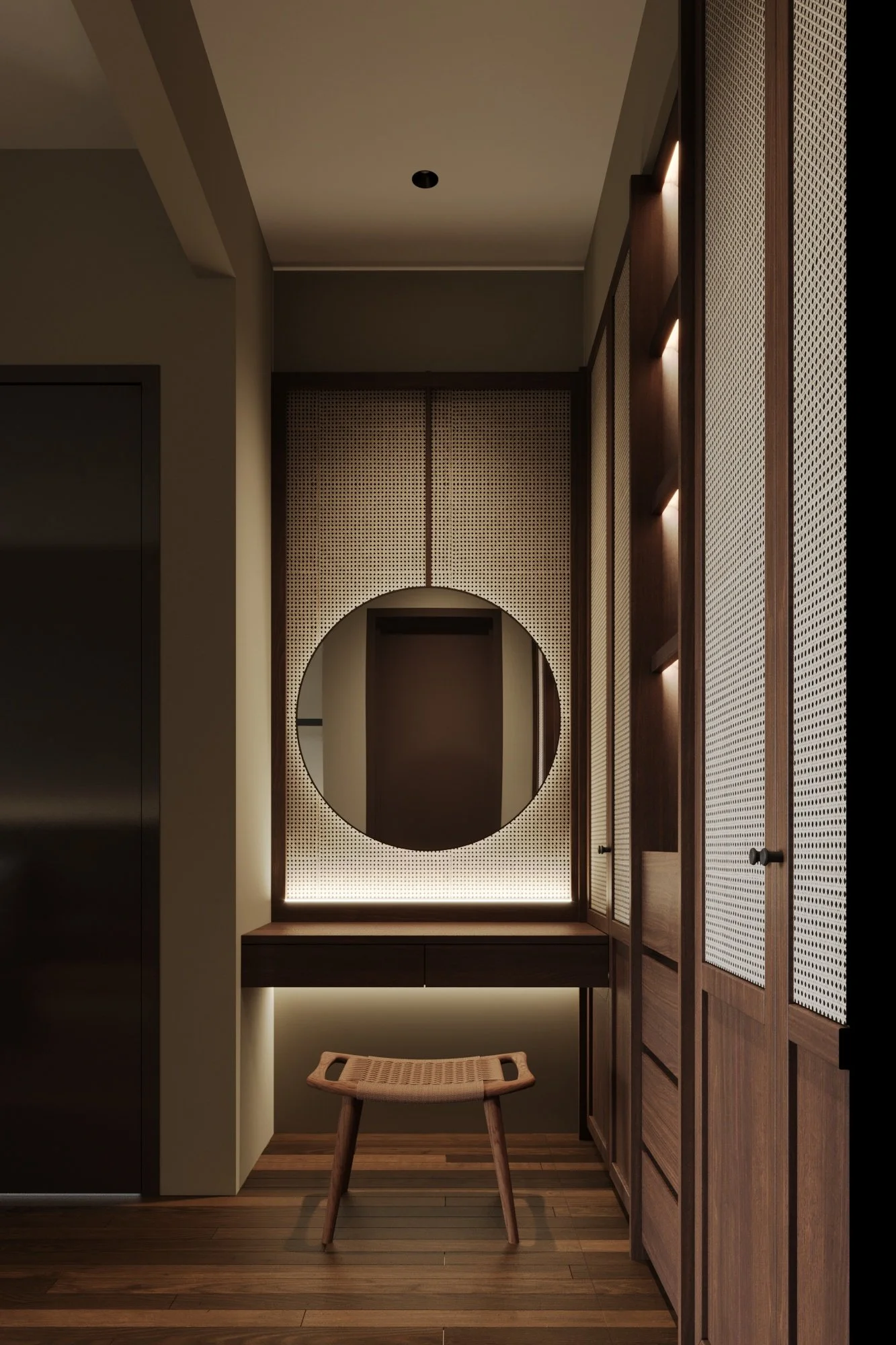 Modern interior hallway with dark wood furniture, a circular mirror, and built-in cabinets with textured doors, illuminated by soft lighting