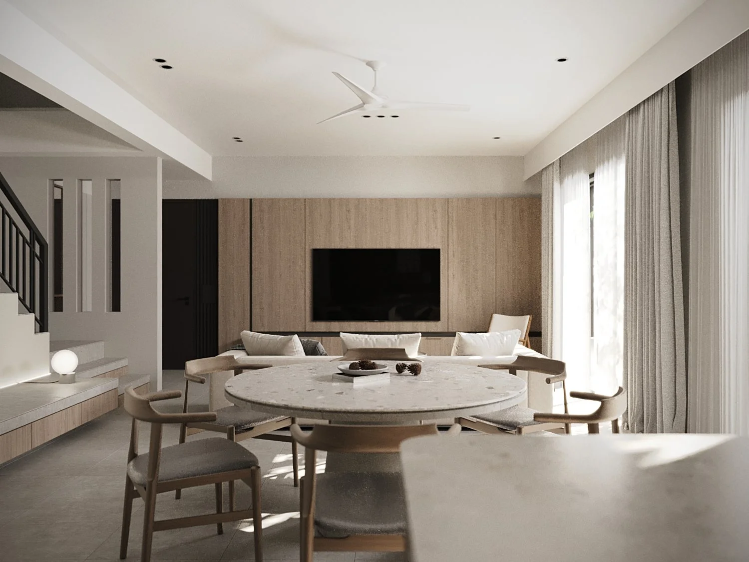 Modern living room with a round dining table, six chairs, a TV on the wall, and large windows with curtains.
