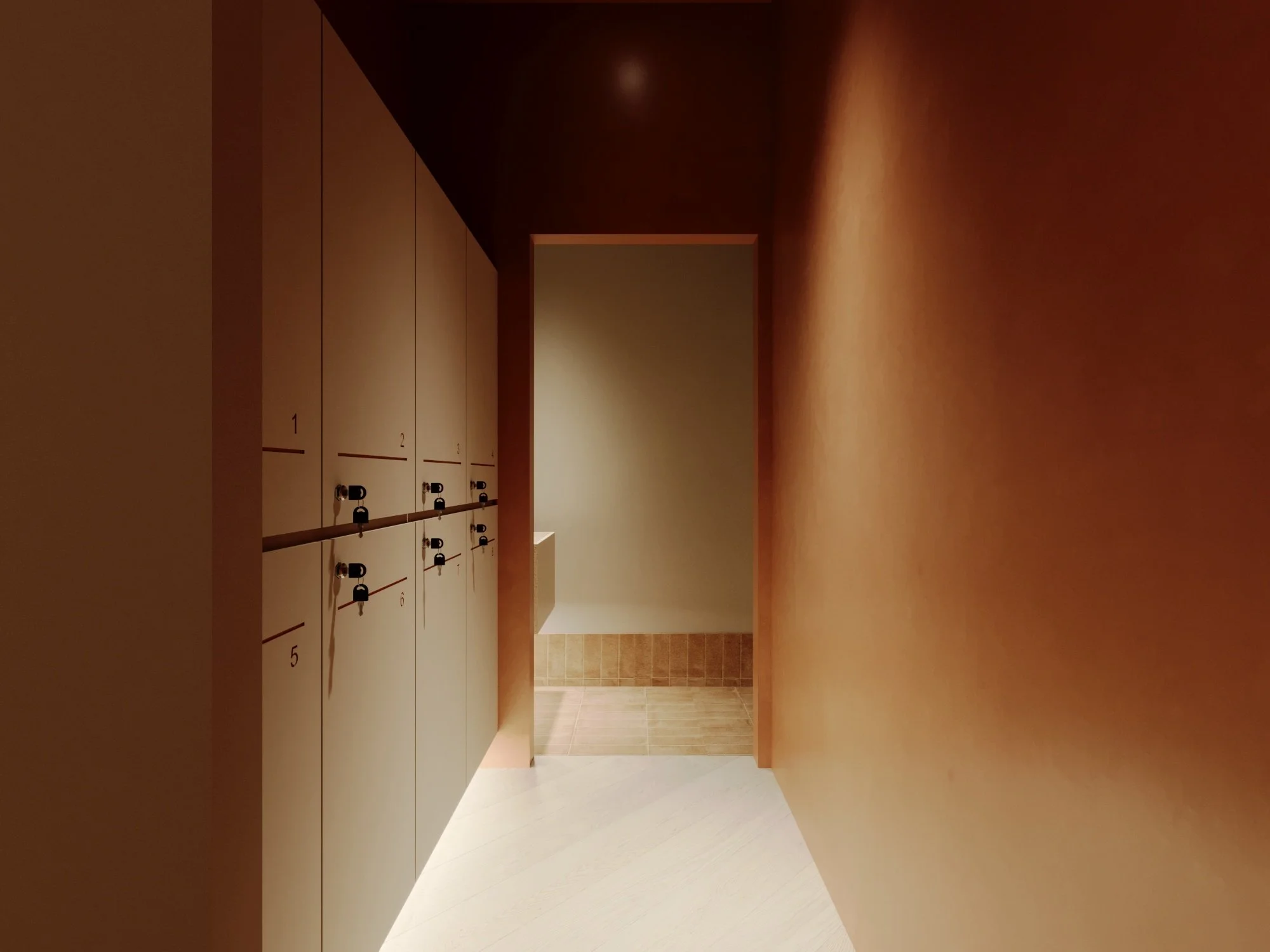 A hallway with beige lockers on the left side, each secured with a black lock, leading to a small open area with a tiled floor and a sink on the back wall.