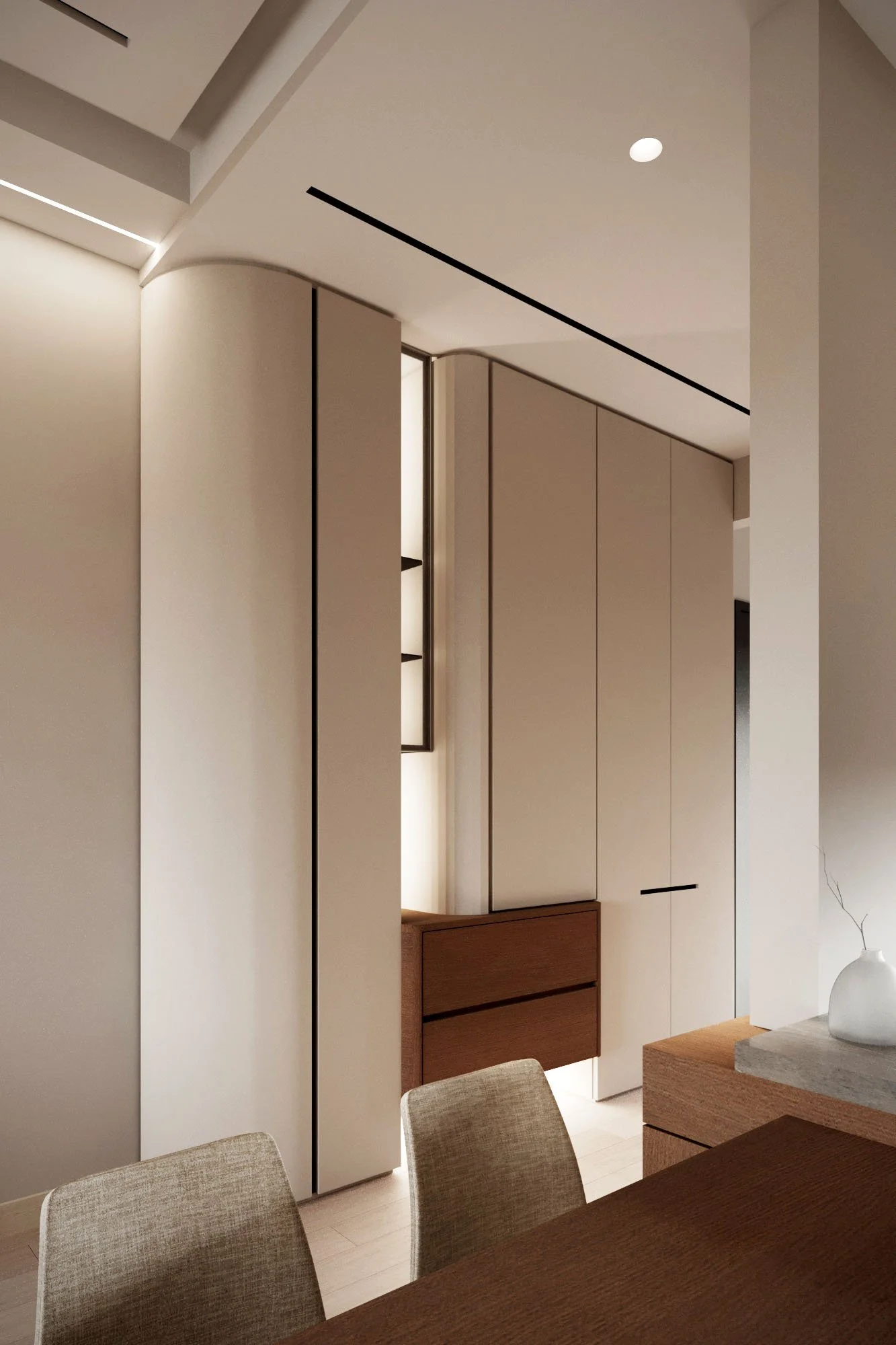 Modern interior view of beige and wooden cabinetry and furnishings in a well-lit room.