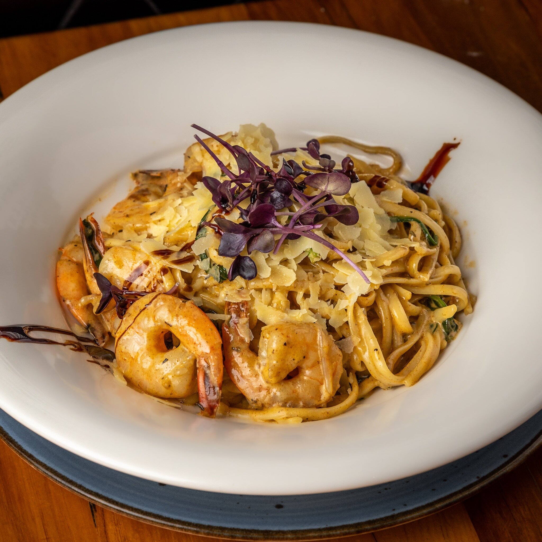 Comfort food cravings at your home away from home in Mt Eden 😉 Cajun Prawn Linguine, with juicy prawn cutlets, fresh spinach and caramelised onion, tossed with linguine pasta in a creamy Cajun &amp; chilli sauce, finished with parmesan cheese 🦐

Vi