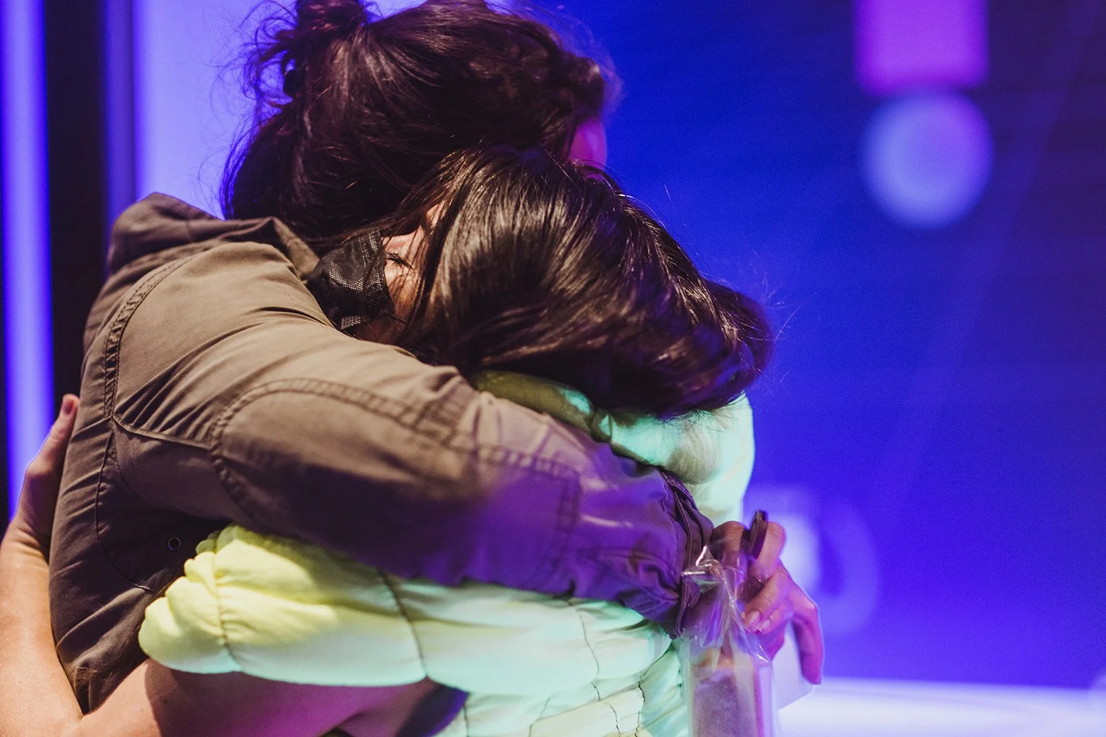 two people embracing in a hug