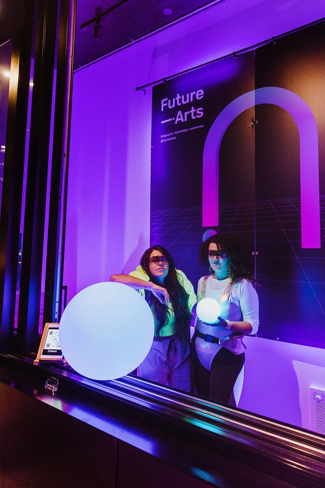 Team membes dressed in futuristic garb