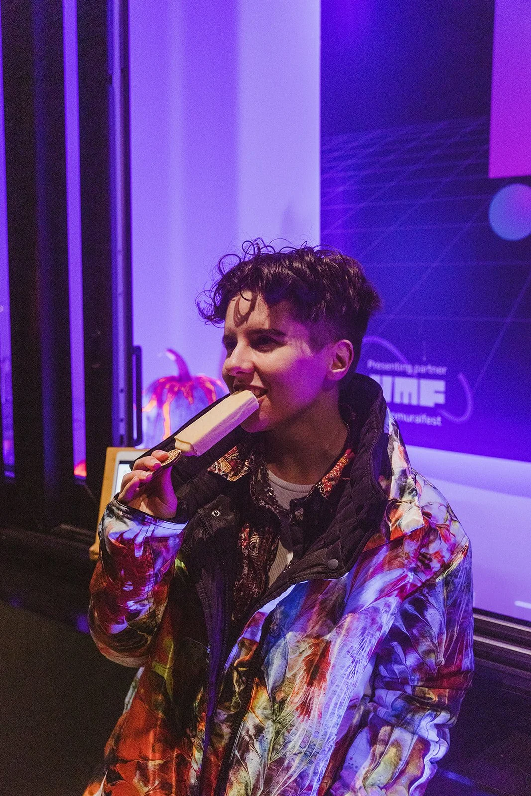 a person tasting the delicious AR+Pops popsicle