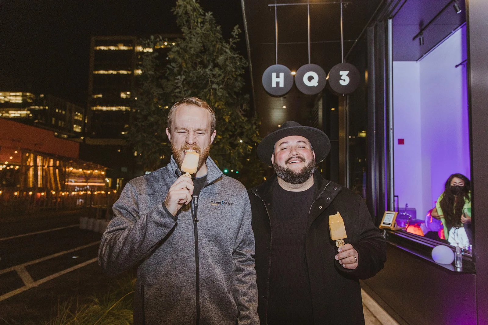 Two people posing with their AR+Pops