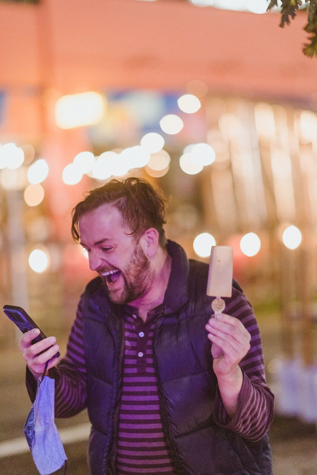 a person with a big open surprised smile while viewing