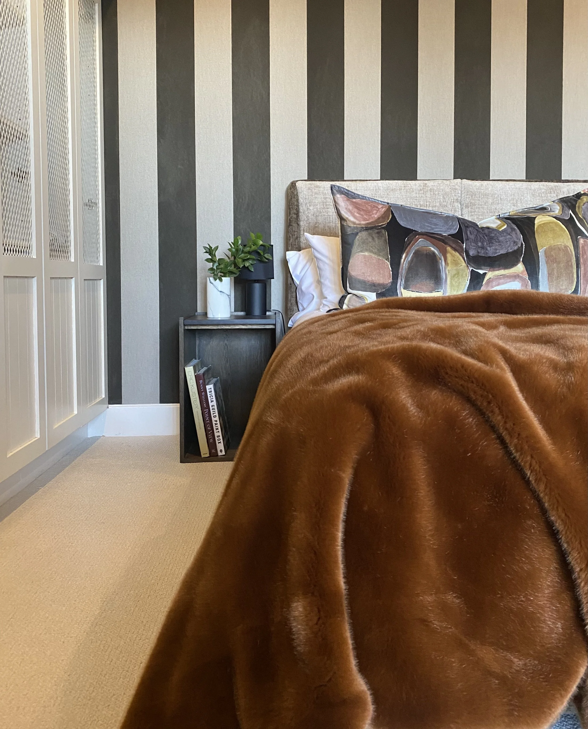 Wallcoverings in Flamant Suite III by Arte. Fur throw in Well Loved by Carlucci.