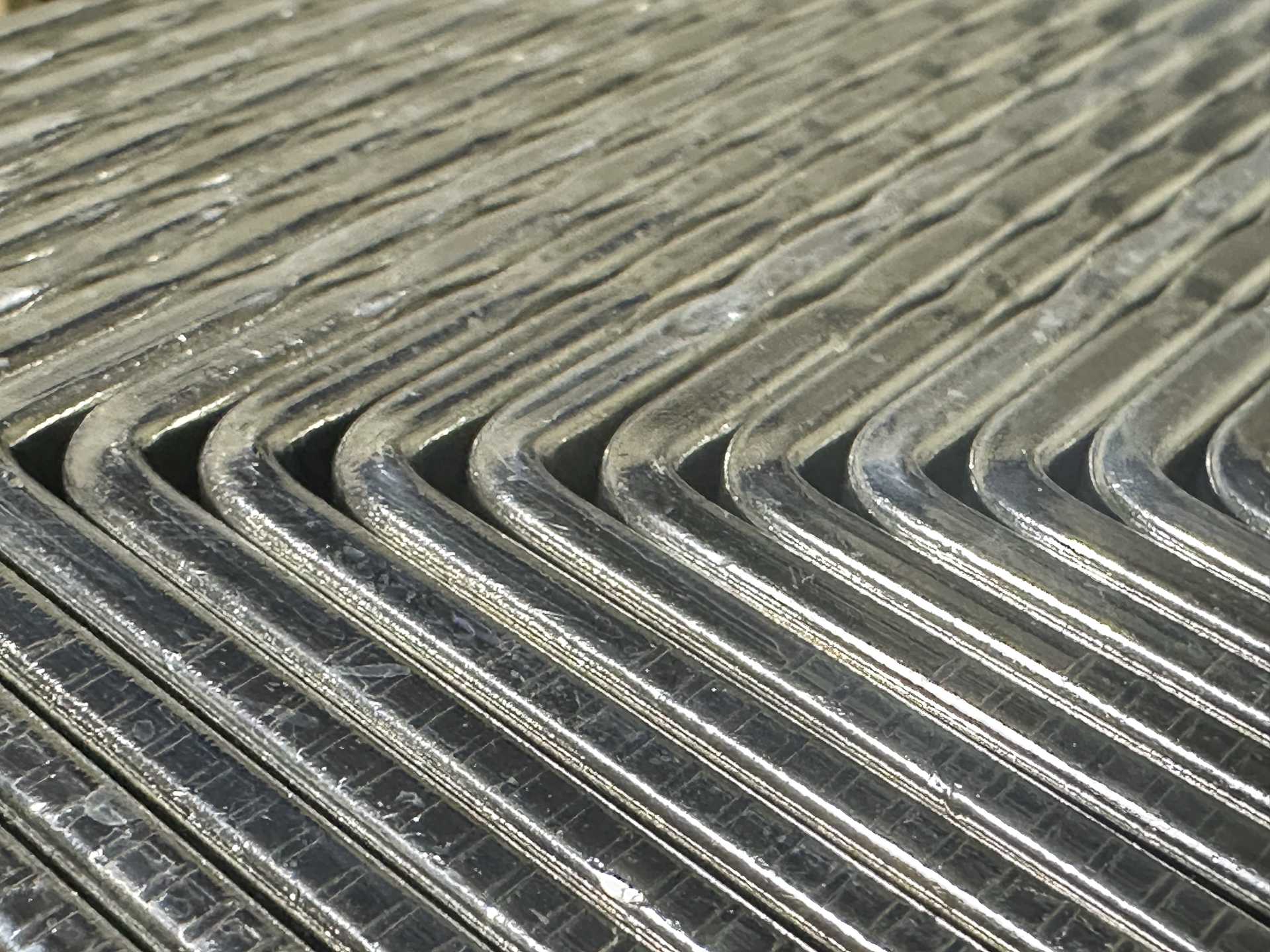 Close-up of a bend on electroplated metal sheets