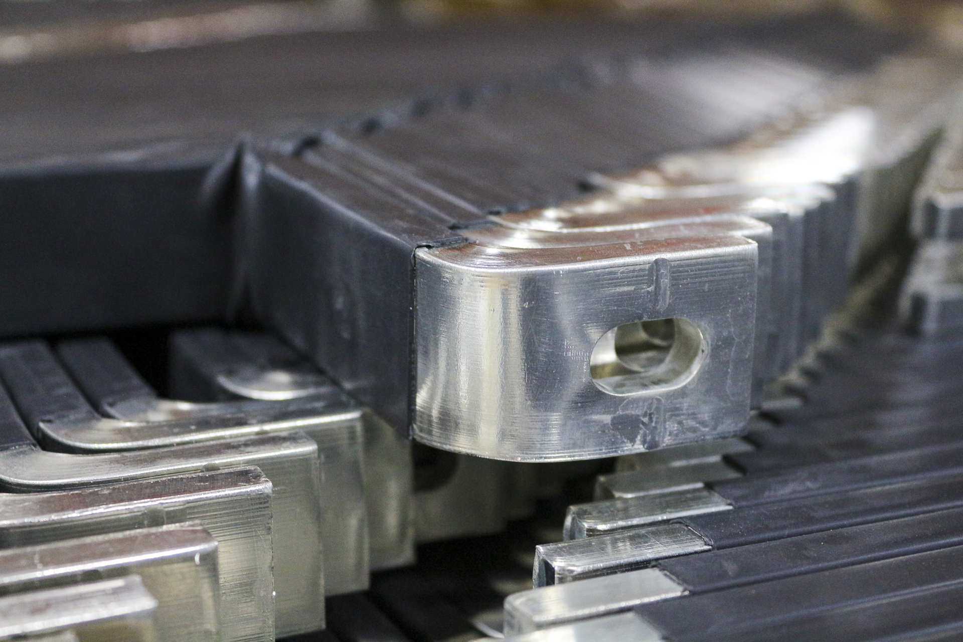 Close-up of heat shrink wrap on electroplated copper bars