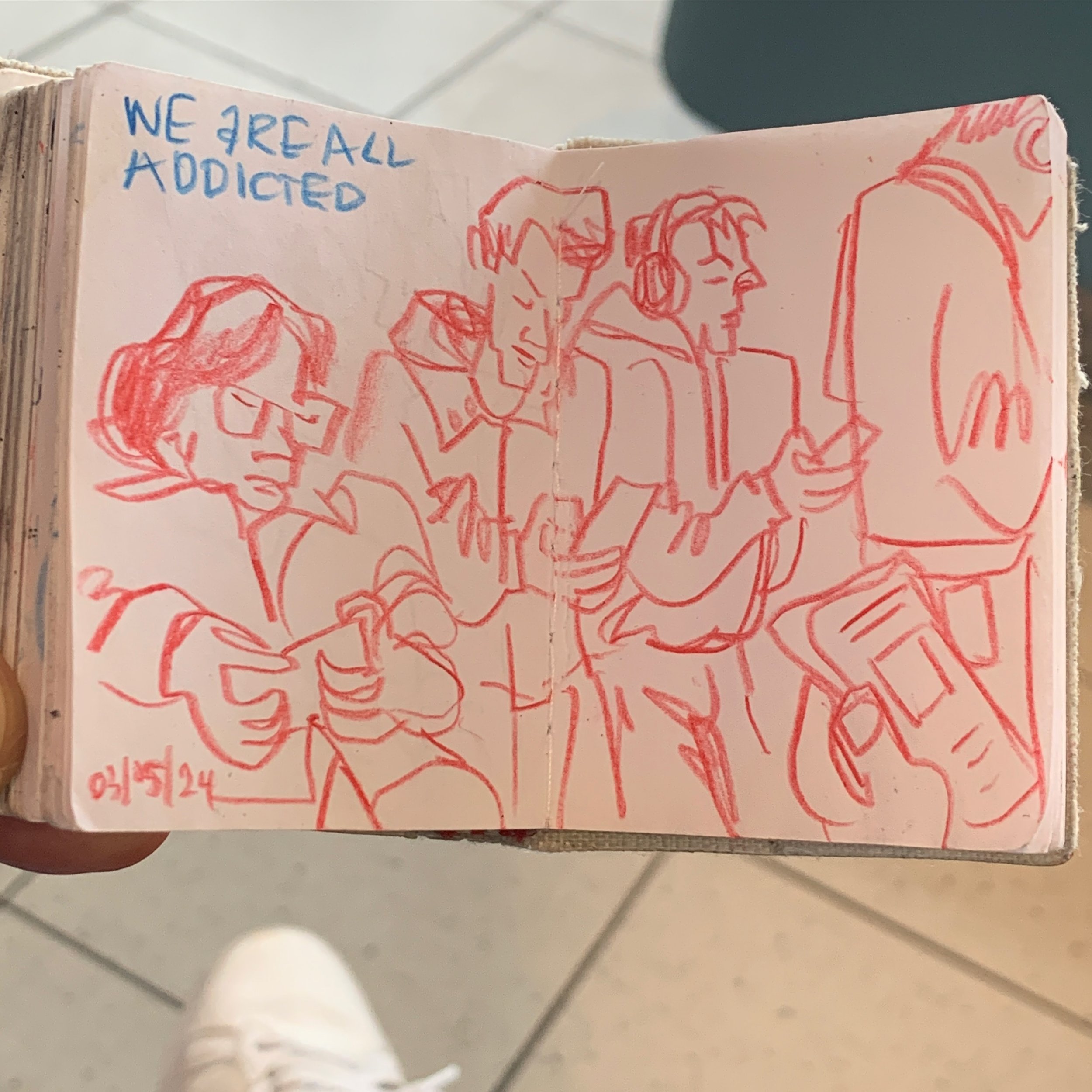 I am on my way to the US. On the train to the airport, I was surrounded by commuters who were all looking at their smart phones. 

Materials used:
-tiny sketchbook, no brand
-steadler blue and red colored pencil