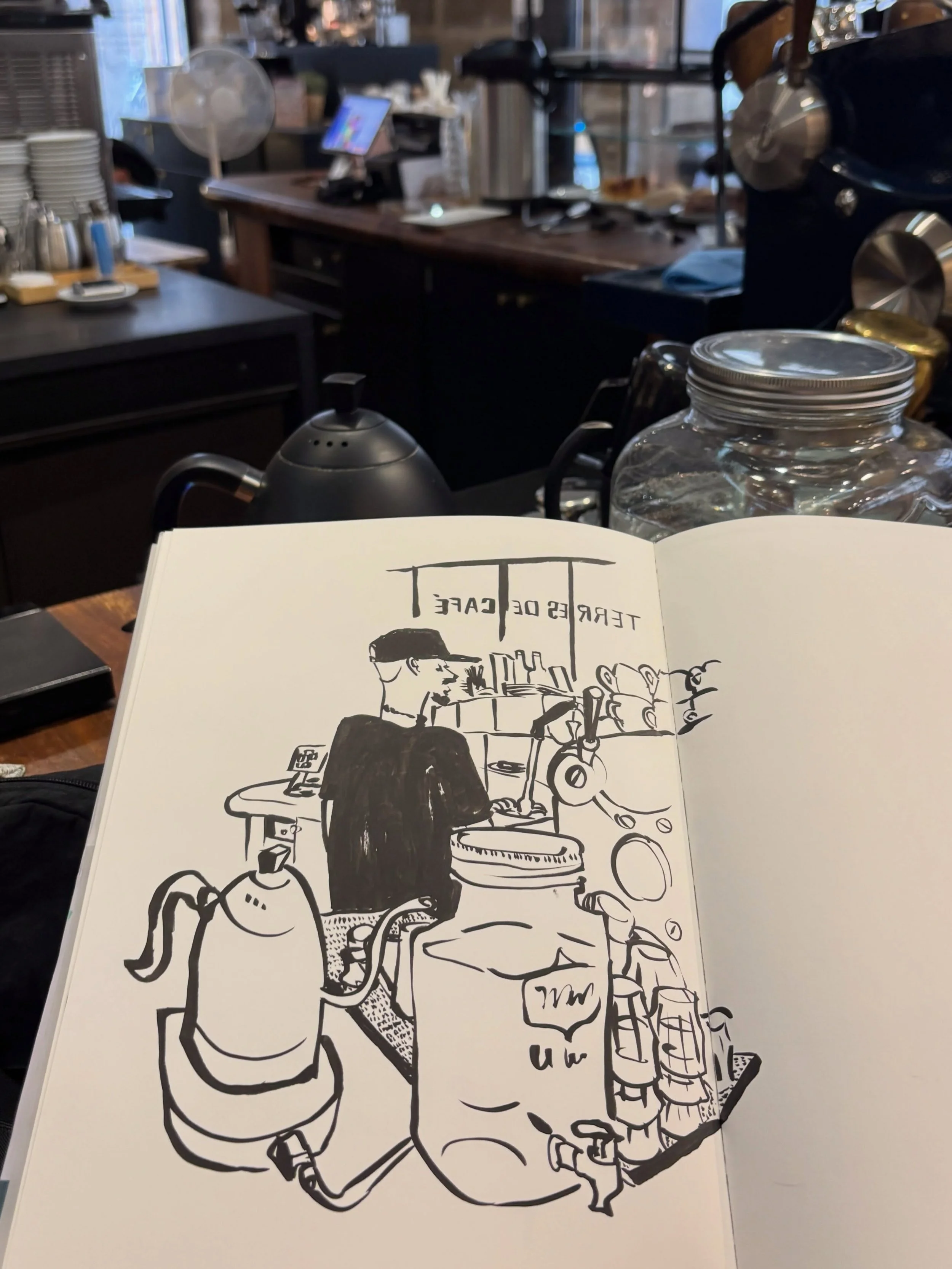 Yesterday&rsquo;s last coffee, last sketchbook spread and last sketch in Paris. 

I filled a whole sketchbook in 9 days in Paris! I now have lots of pages to scan. 

Materials used:
-Hahnem&uuml;hle Nostalgie sketchbook, size A4
-Pentel pocket brush 