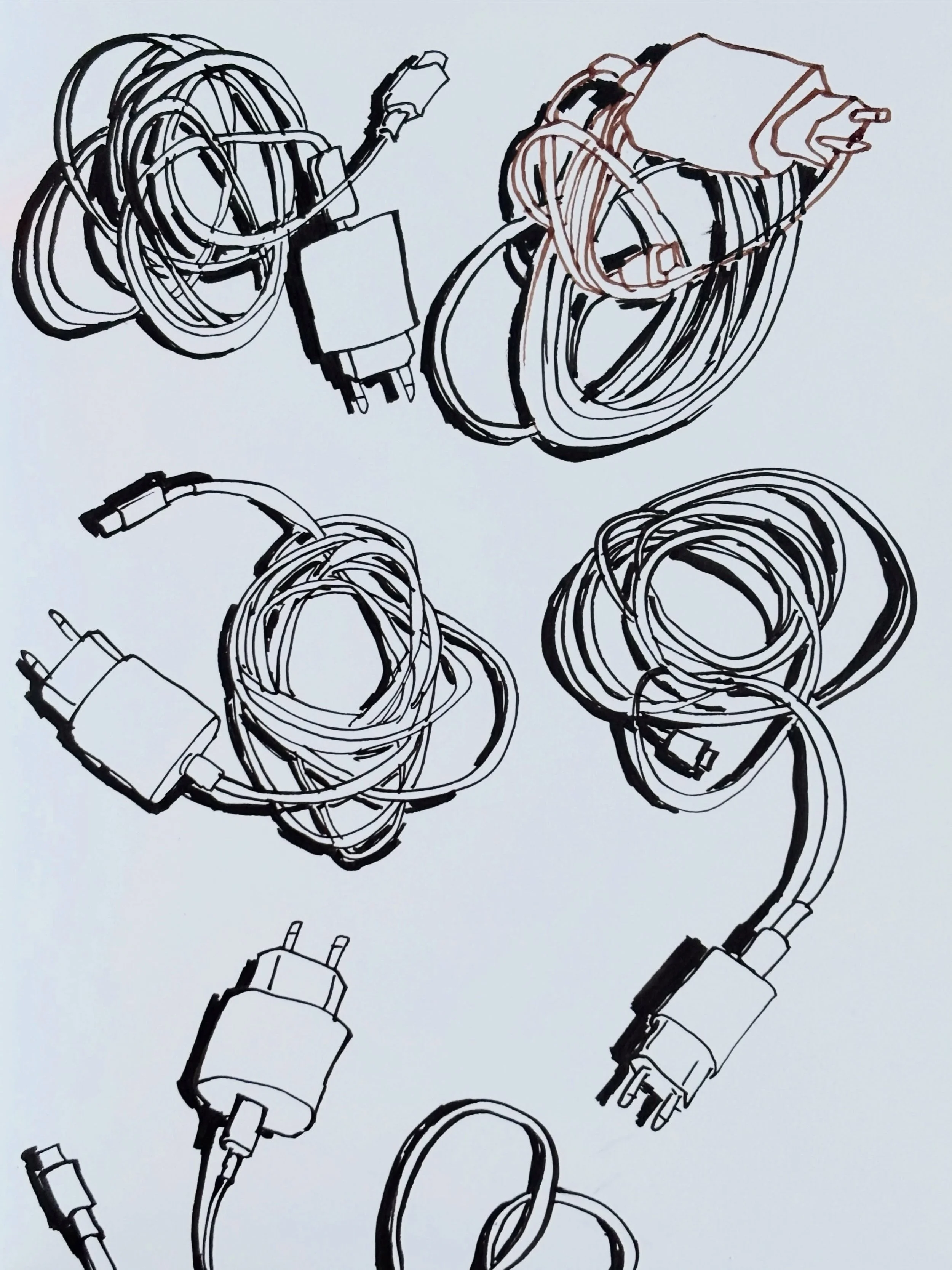 Do you ever feel stuck on a blank page? Just start drawing the same thing again and again!

Pick anything: a piece of fruit, a coffee cup, a shoe, whatever catches your eye. Today I drew the thing closest to me: the charger cord. I changed its positi
